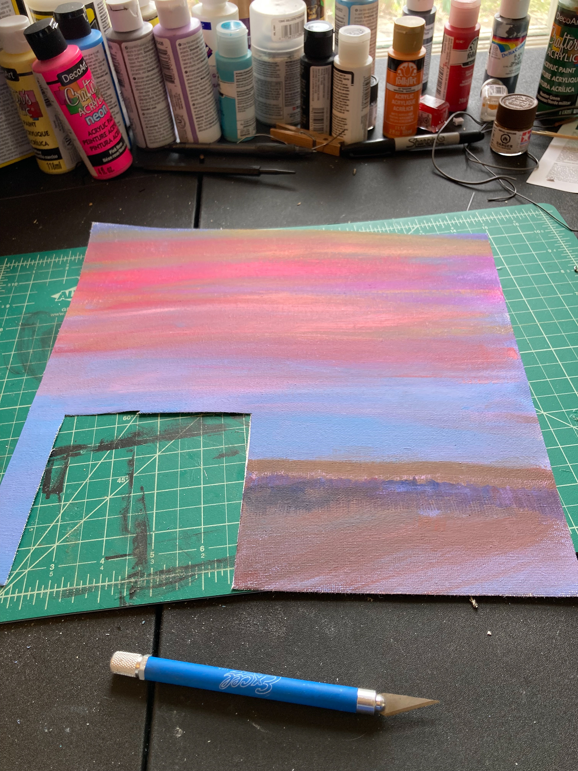 My best friend Victoria Hutchinson lent her colour theory knowledge to help me match the reference. It's painted on canvas, then glued inside around the corners.