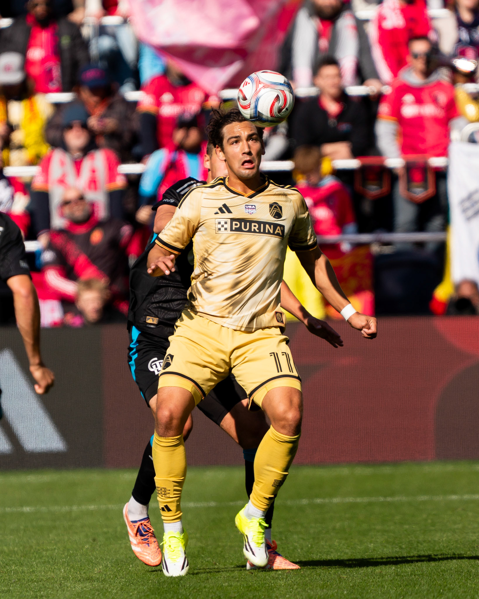 St. Louis CITY SC forward Simon Becher (11) heads the ball against Charlotte FC.St. Louis City SC vs. FC Charlotte on February 21, 2026 at Energizer Park in St. Louis, MO. Photo by Daniel Laubhan