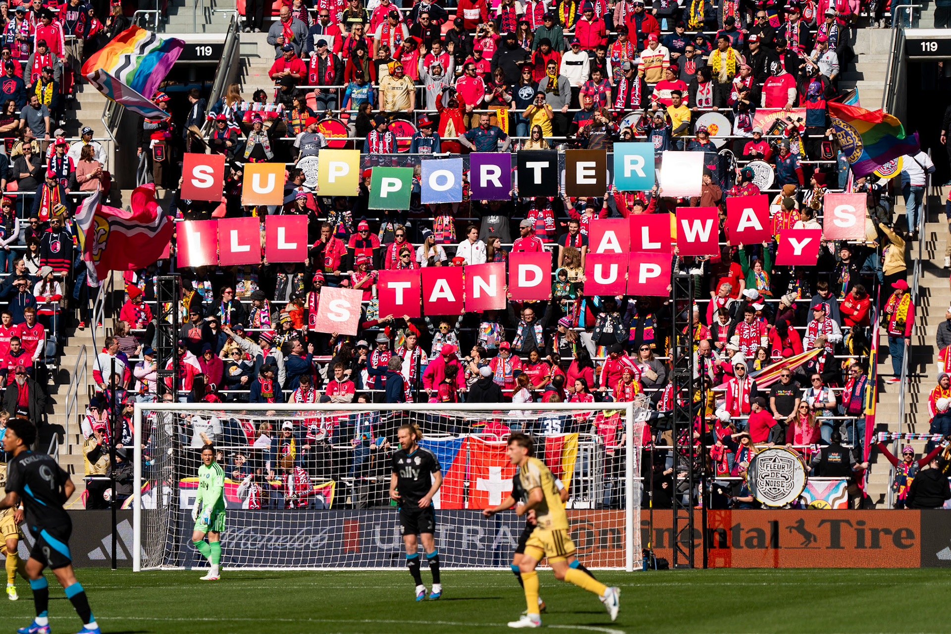 Fans hold up signs against Charlotte FC.St. Louis City FC vs. FC Charlotte on February 21, 2026 at Energizer Park in St. Louis, MO. Photo by Daniel Laubhan
