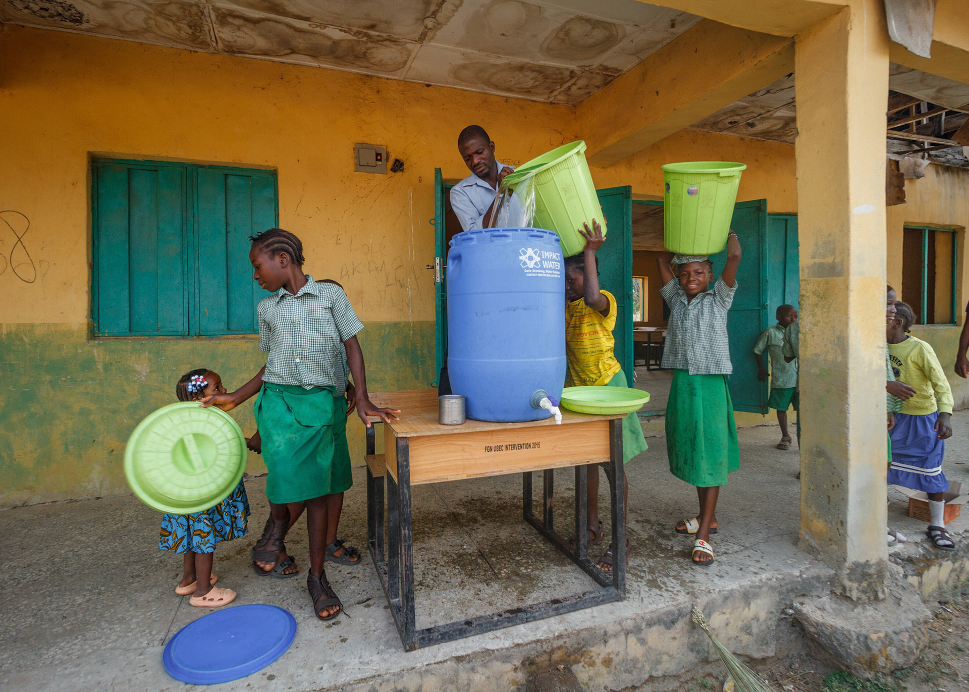 Filling the hand wash bucket