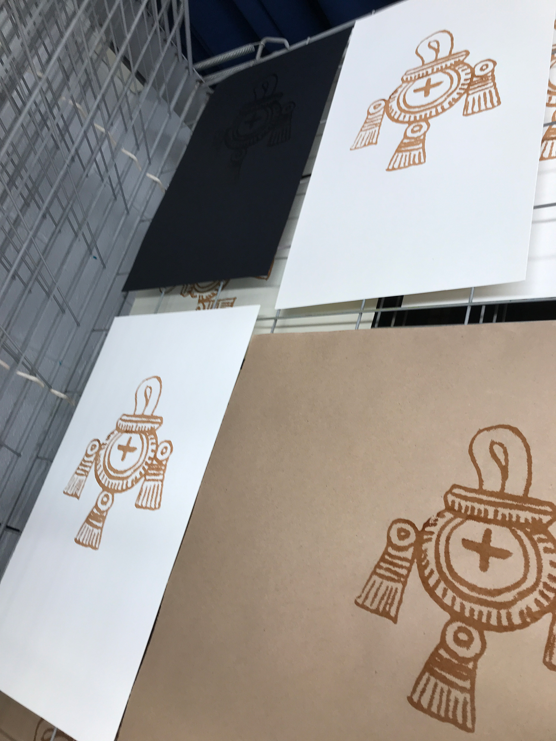 Screenprints in chocolate syrup. Unfortunately chocolate syrup does not completely dry so the prints are sticky to this day!