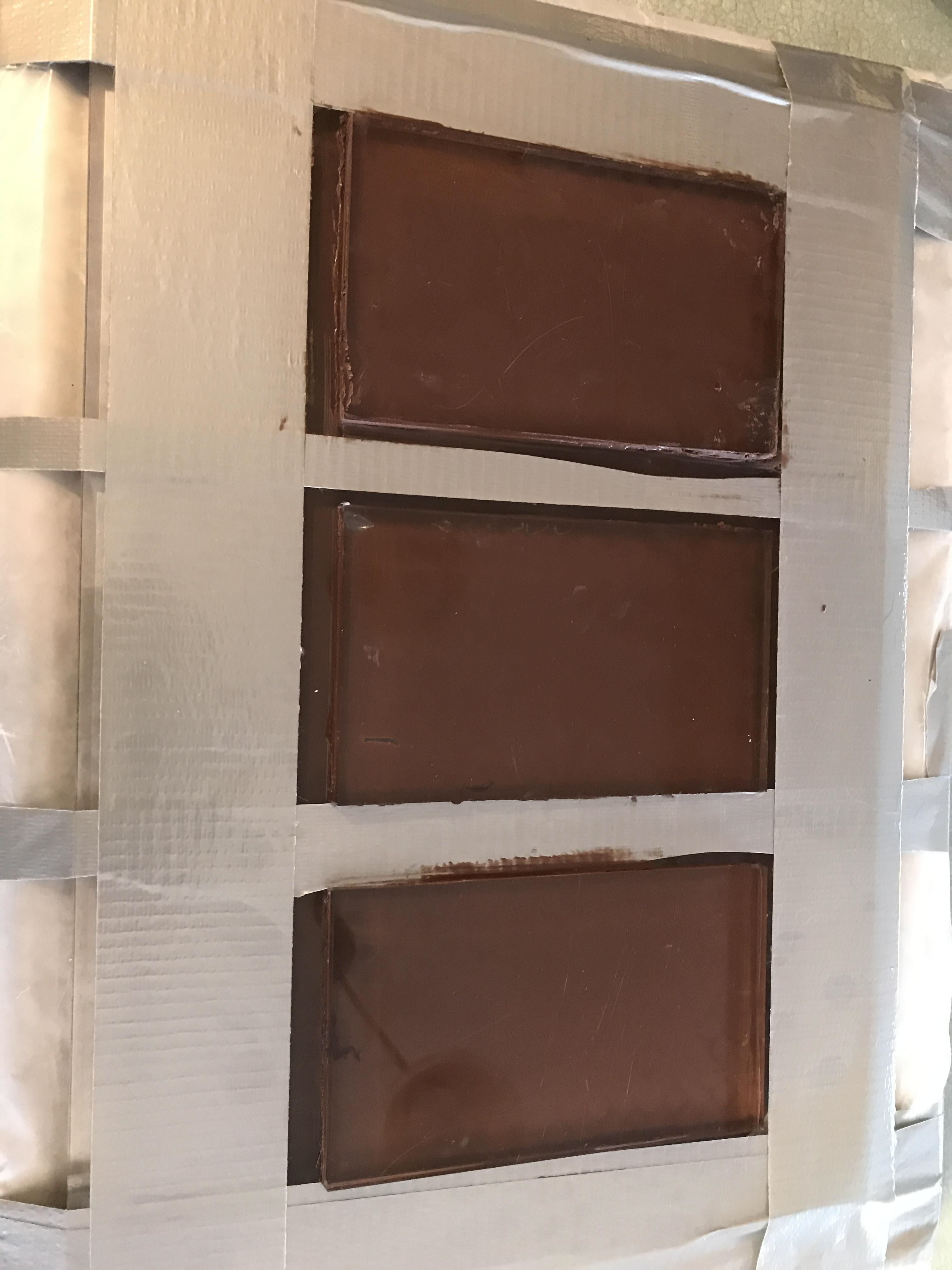 Making the chocolate bars themselves took a little over a week. The process came with its challenges of bars snapping, sticking to the wax paper, having uneven or broken edges, and having rough surfaces but luckily it's just chocolate so I was able to re-melt and re-mold the bars until they were just right.