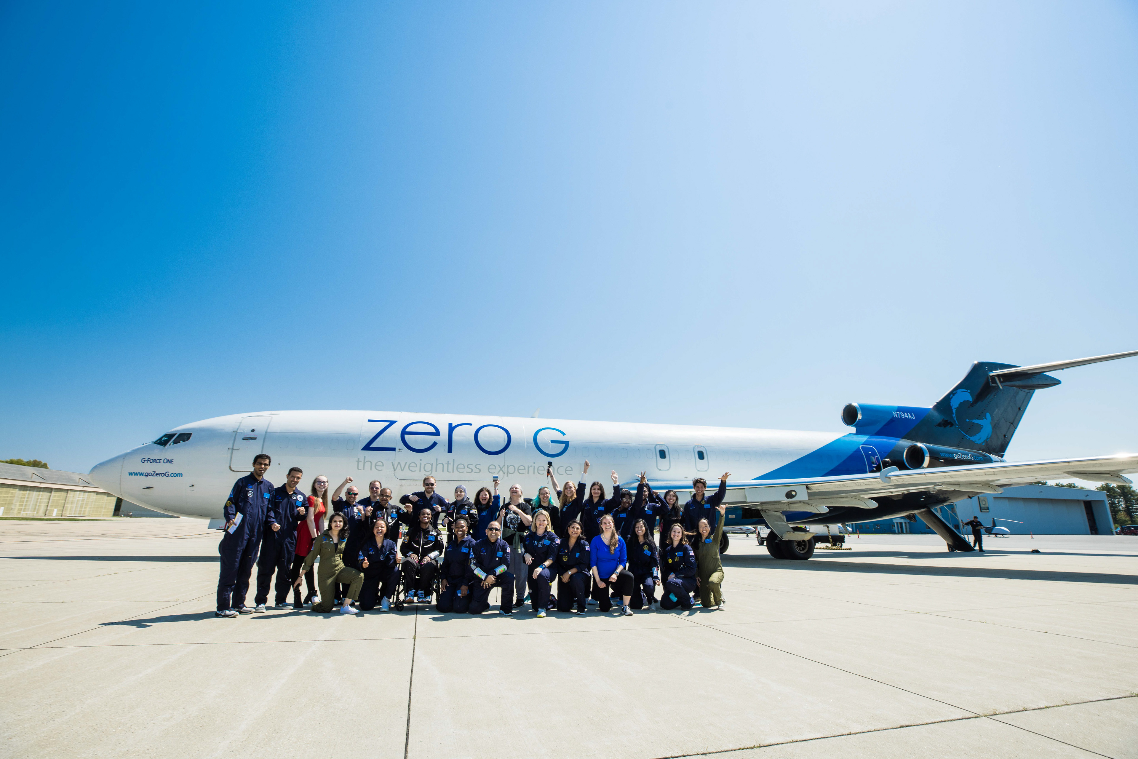 The whole crew poses in front of the large Boeing 747 plane. Credit Zero G Corp and Steve Boxall