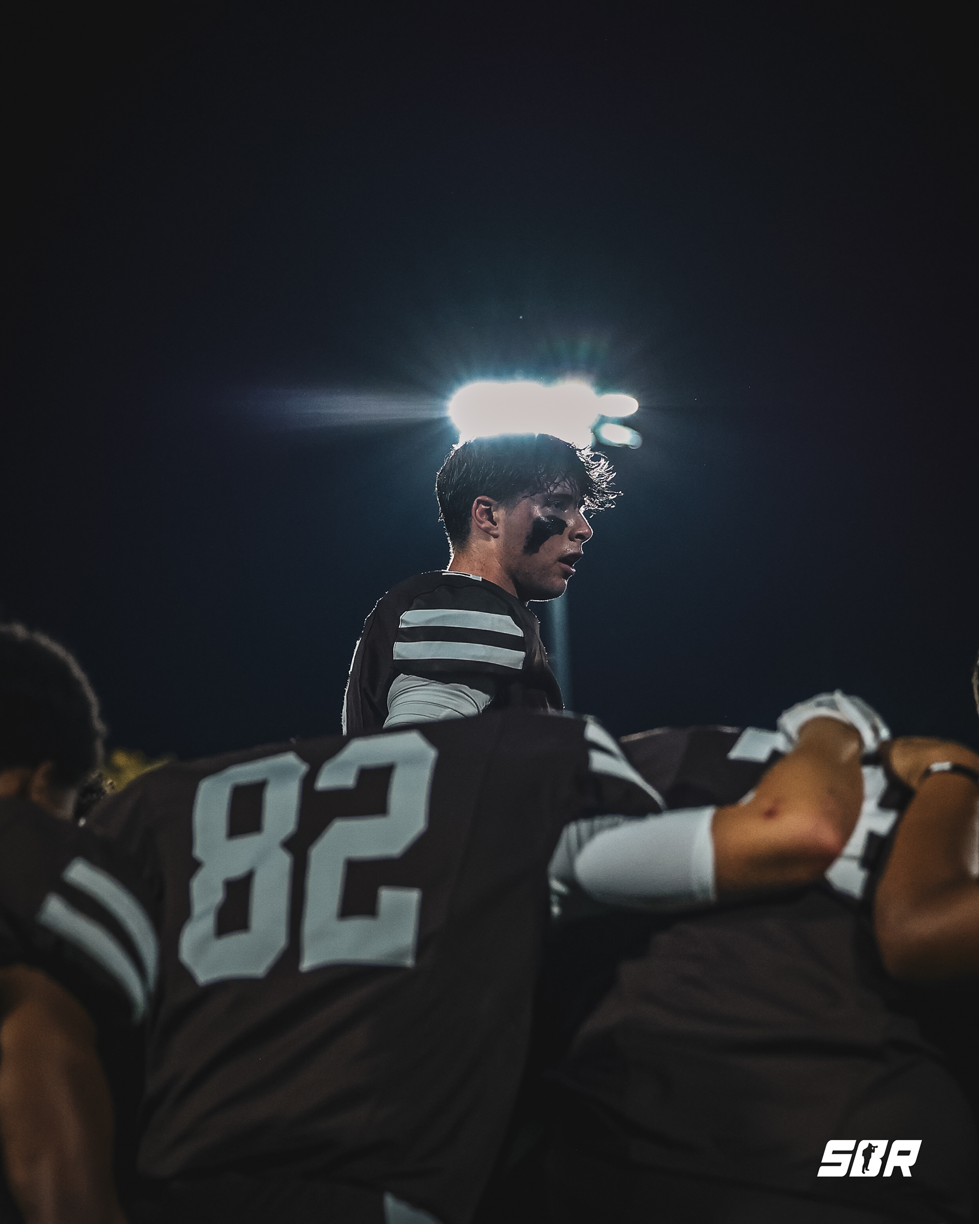 Jack Elliot (9) leads his team in prayer before a game.