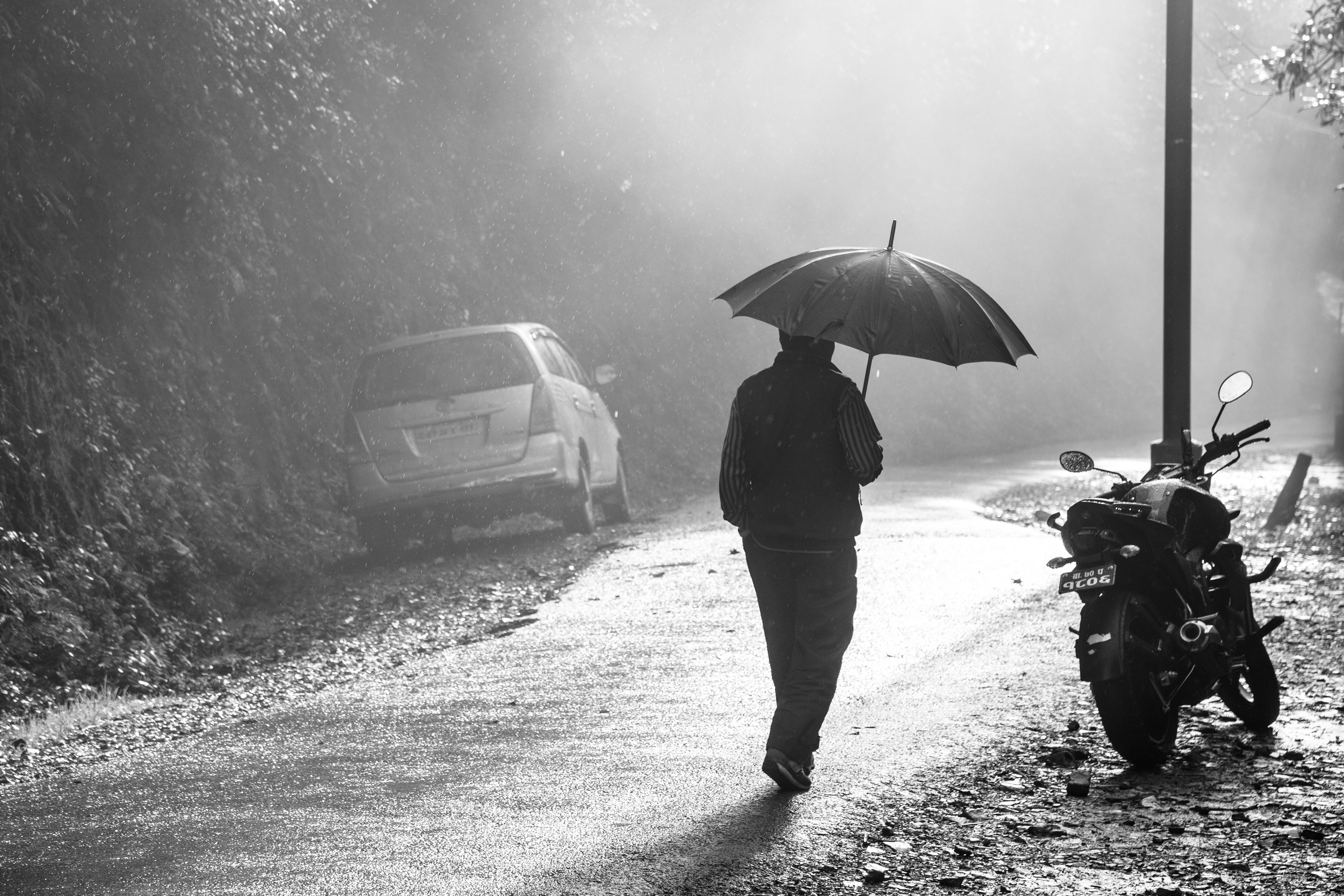 Man with umbrella - Nepal