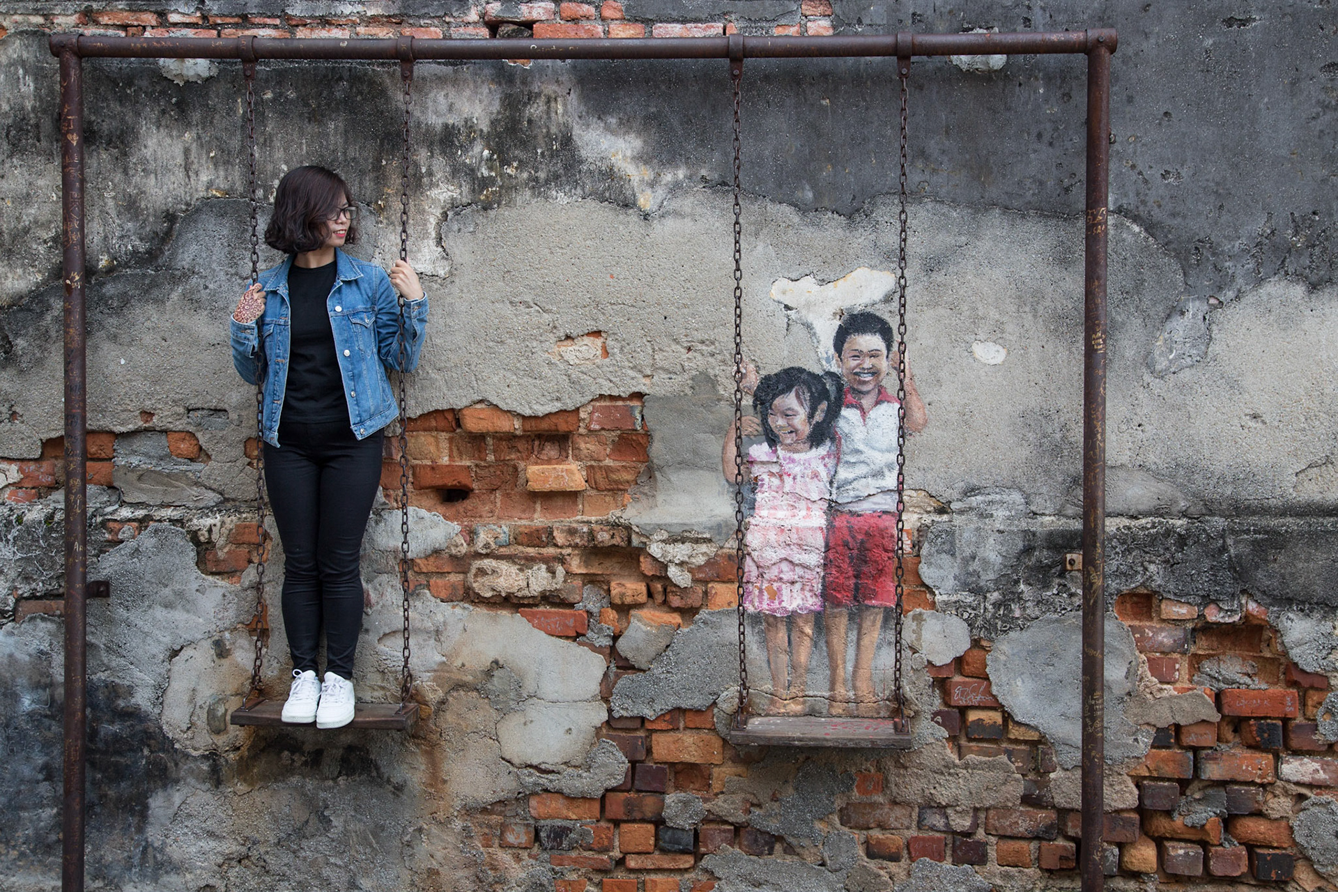 Girl with street art - Penang Island, Malaysia