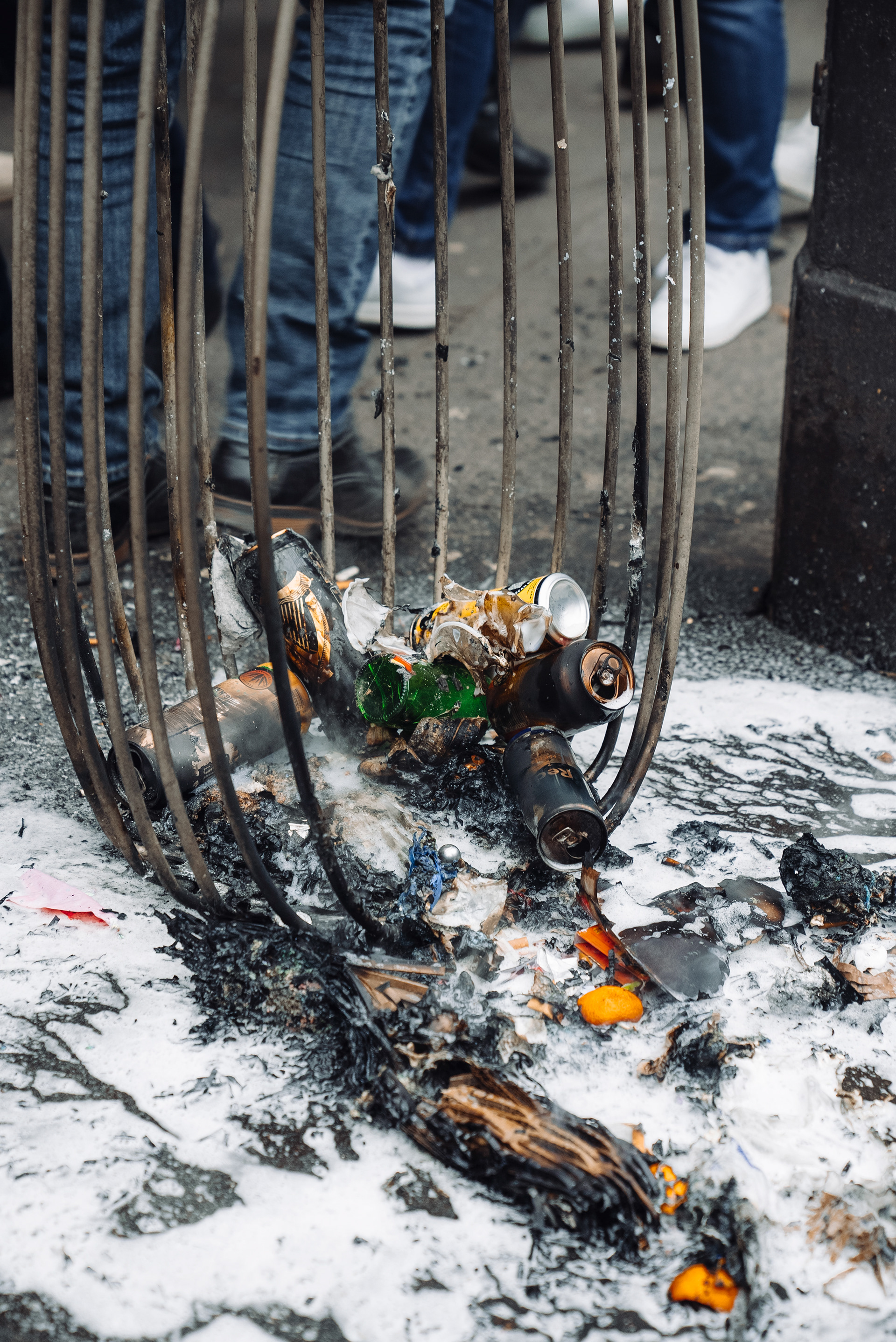 The fire brigade put out a burning trash can