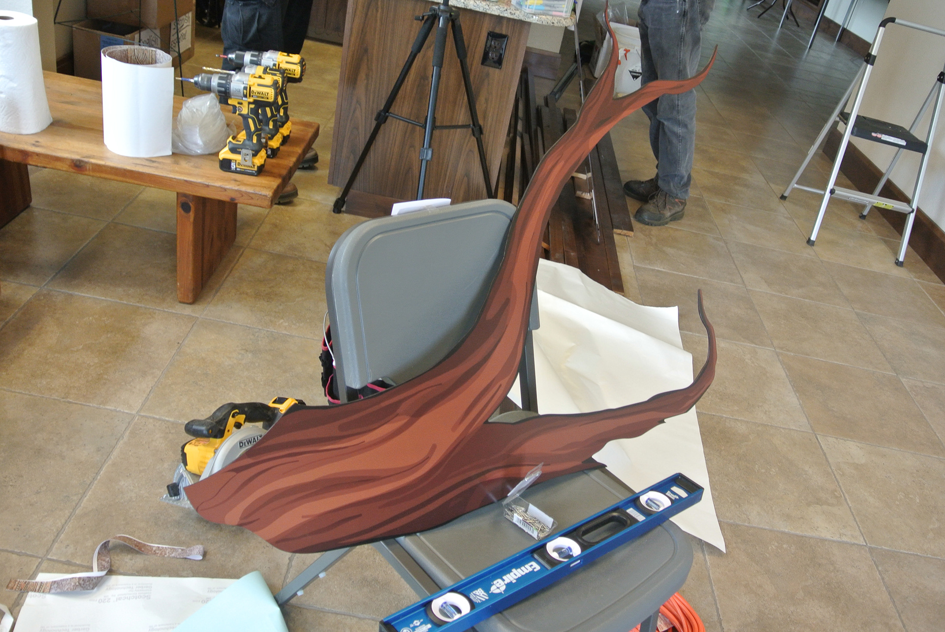 Due to material and production constraints, the tree, leaves, and plaques were all created as separate pieces, and installed individually.