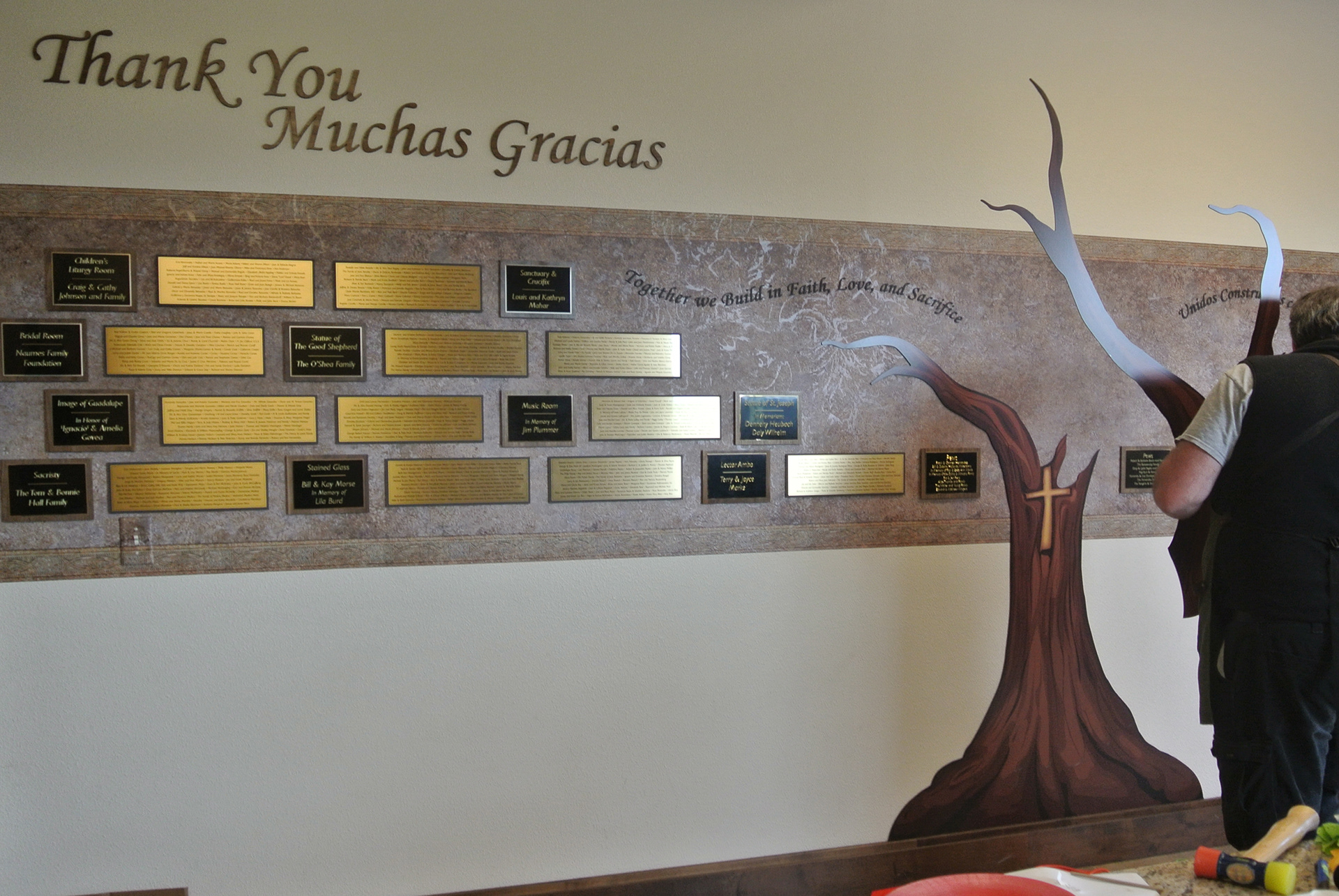 The tree, leaves, and plaques were all created as separate pieces, and installed individually.