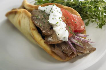 Seared lamb gyro meat, lettuce, onions, tomatoes, feta and our homemade Tzatziki sauce served on pita bread