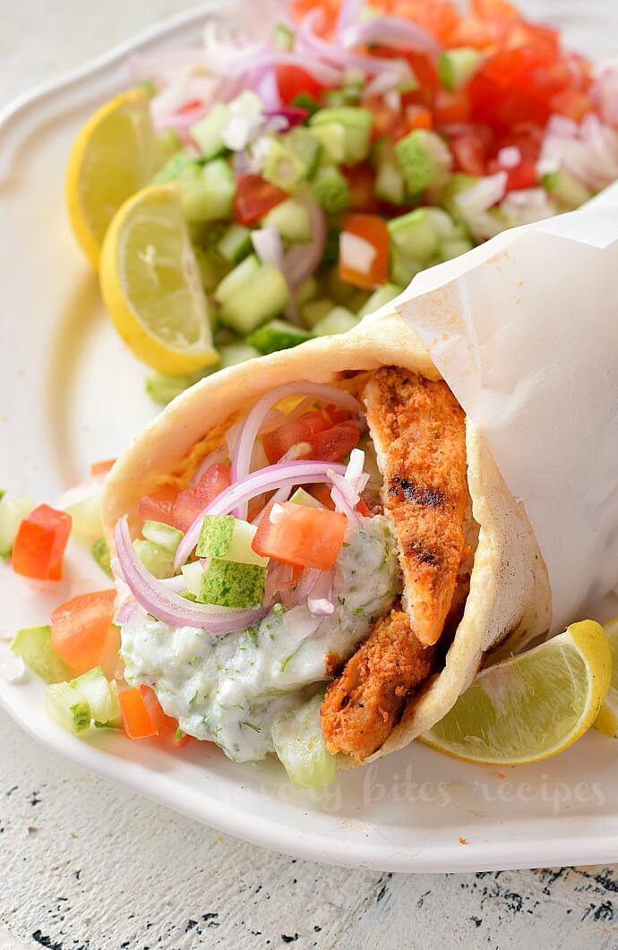 Chicken Gyro Seasoned chicken, lettuce, onions, tomatoes, feta and our homemade Tzatziki sauce served on pita bread.