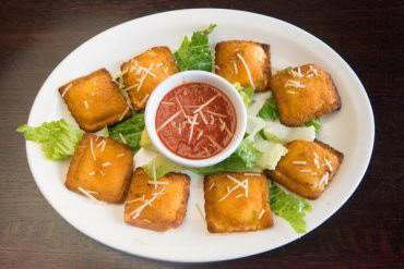 Breaded Cheese Ravioli Breaded with spicy Italian seasonings, and served with marinara sauce.