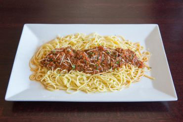 Spaghetti In house-made marinara or meat sauce.