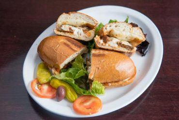 Chicken Parmesan Marinara base, tender chicken breast, mushrooms, onions, parmesan & mozzarella cheeses.