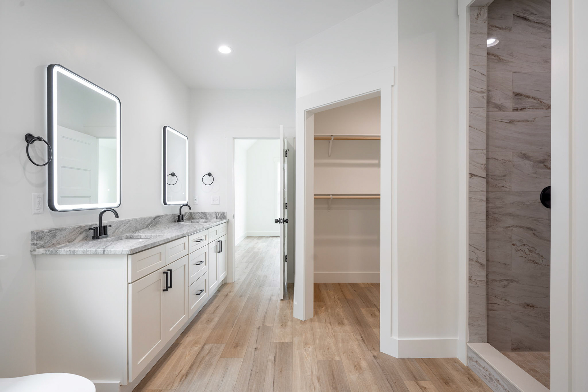 Master Bathroom Featuring LED Mirrors