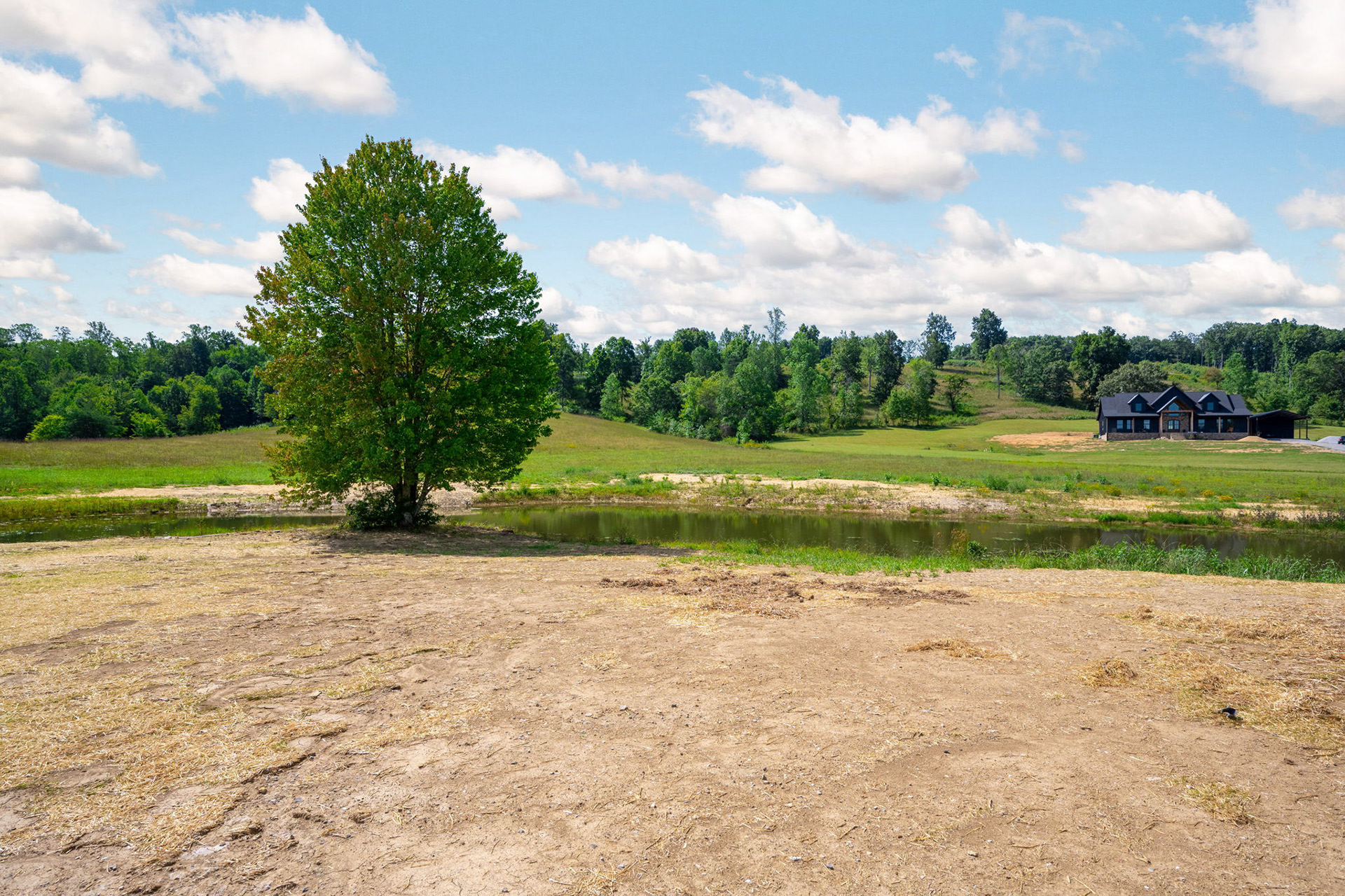 3.38 Acre Property Featuring over 1.5 Acre Pond