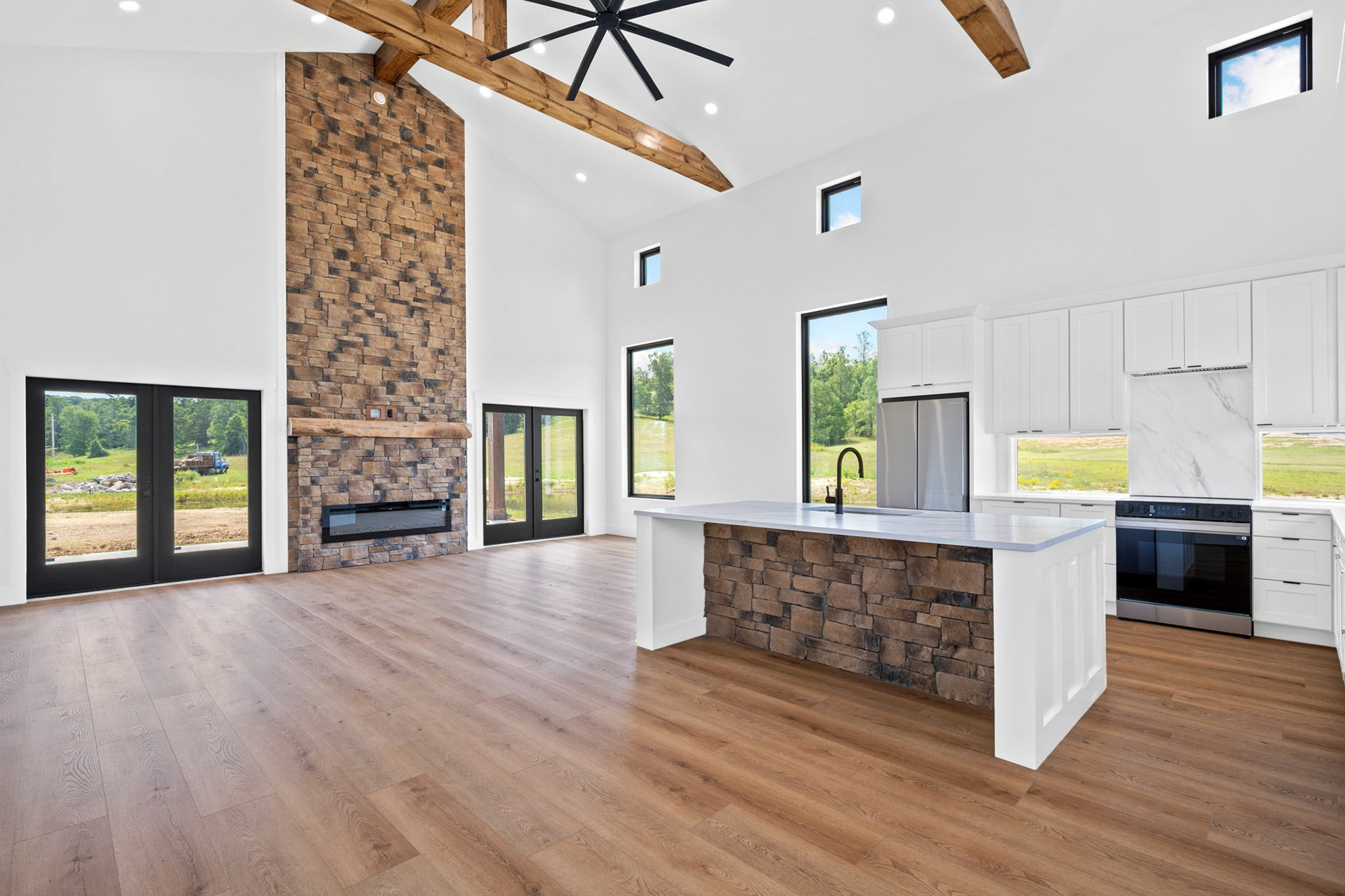 Open Concept Kitchen/Living Featuring Cedar Beams