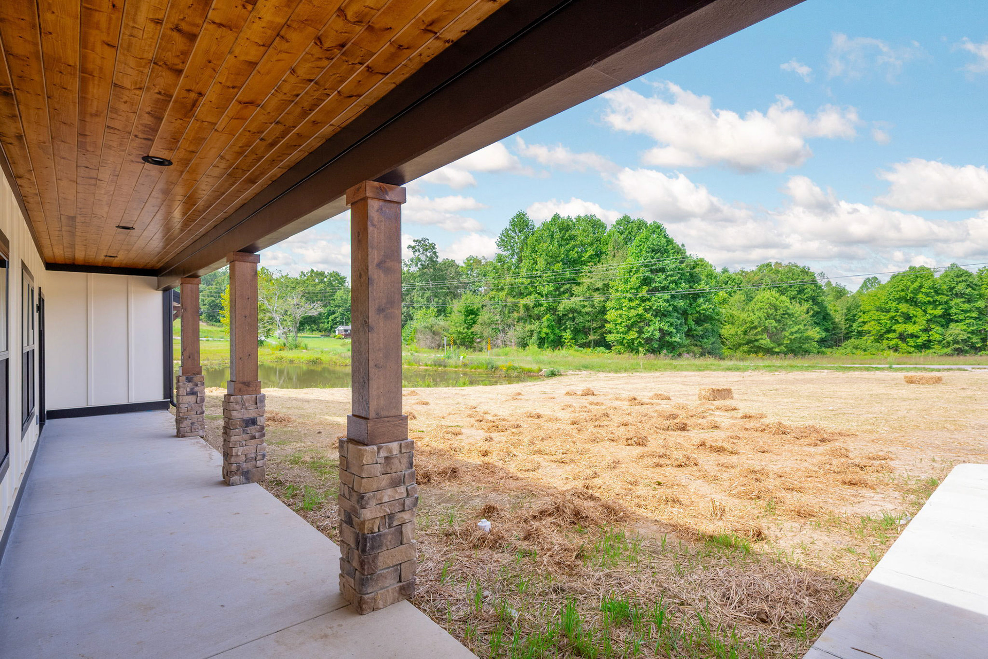 Covered Front Porch Featuring Pine T&G