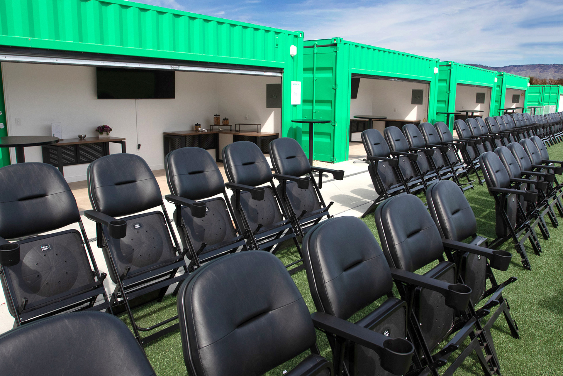 sideline seating on the pitch behind goal