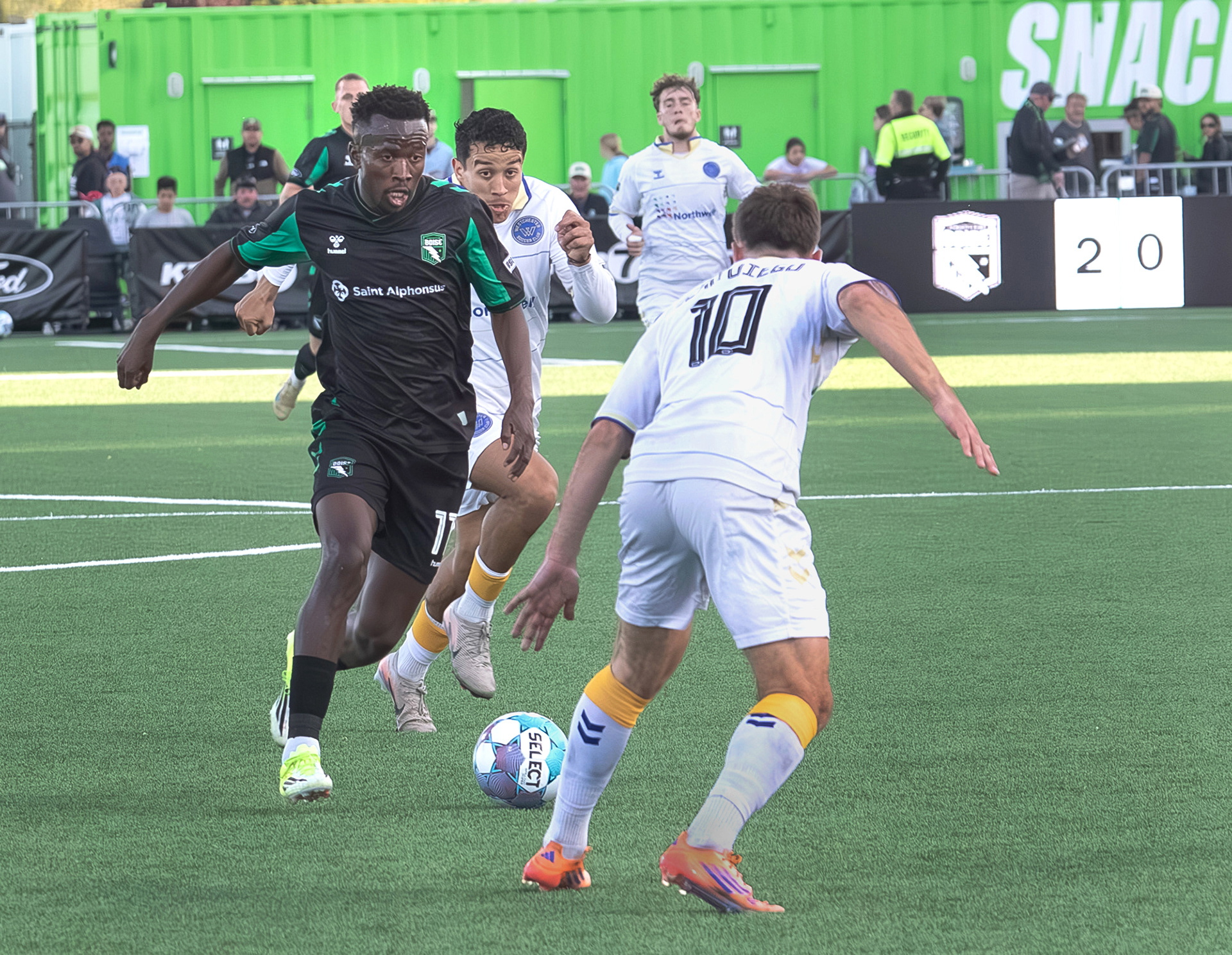 Robinson Moshobane (11) for  Athletic Club Boise works the ball around Westchester Soccer Club's defense during soccer match at Les Bois Park on Saturday, April 18. 2026