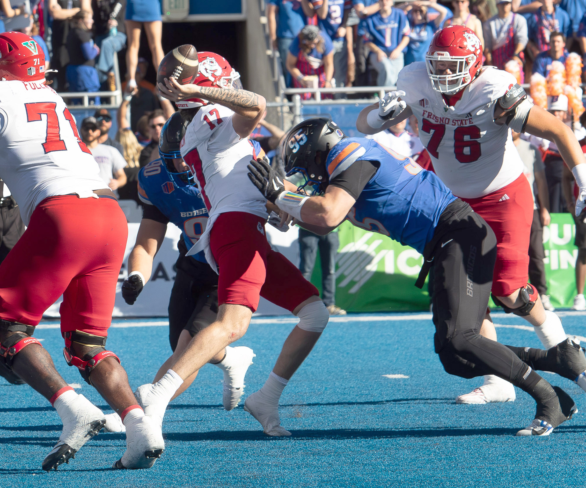 Boise State University's defense tackling Fresno State quarter back during football game Albertsons Stadium Saturday, November 1, 2025