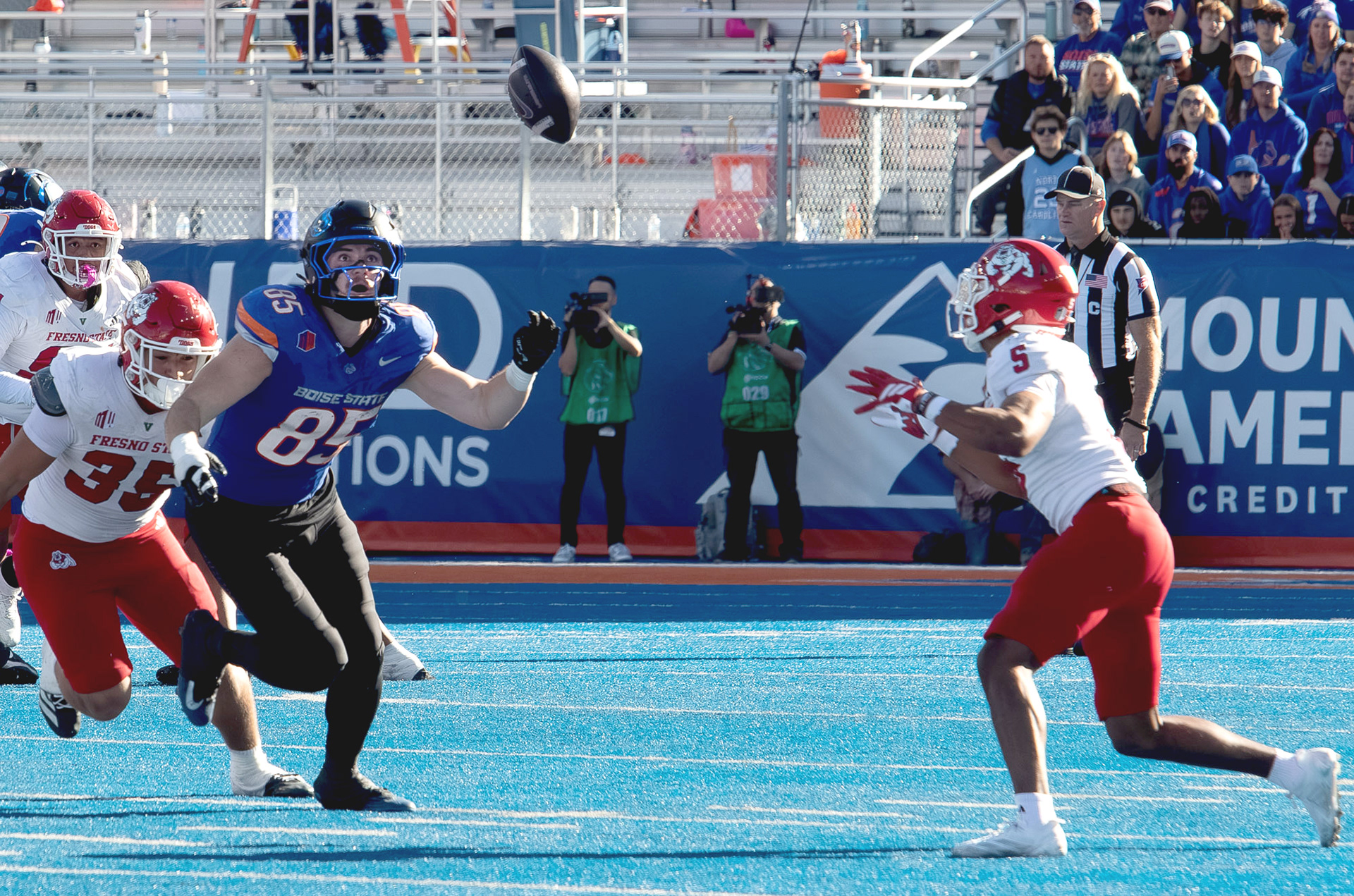 A pass intended for Boise State University's Matt Lauter is intercepted by Fresno State's Josiah Freeman during football game at  Albertsons Stadium Saturday, November 1, 2025