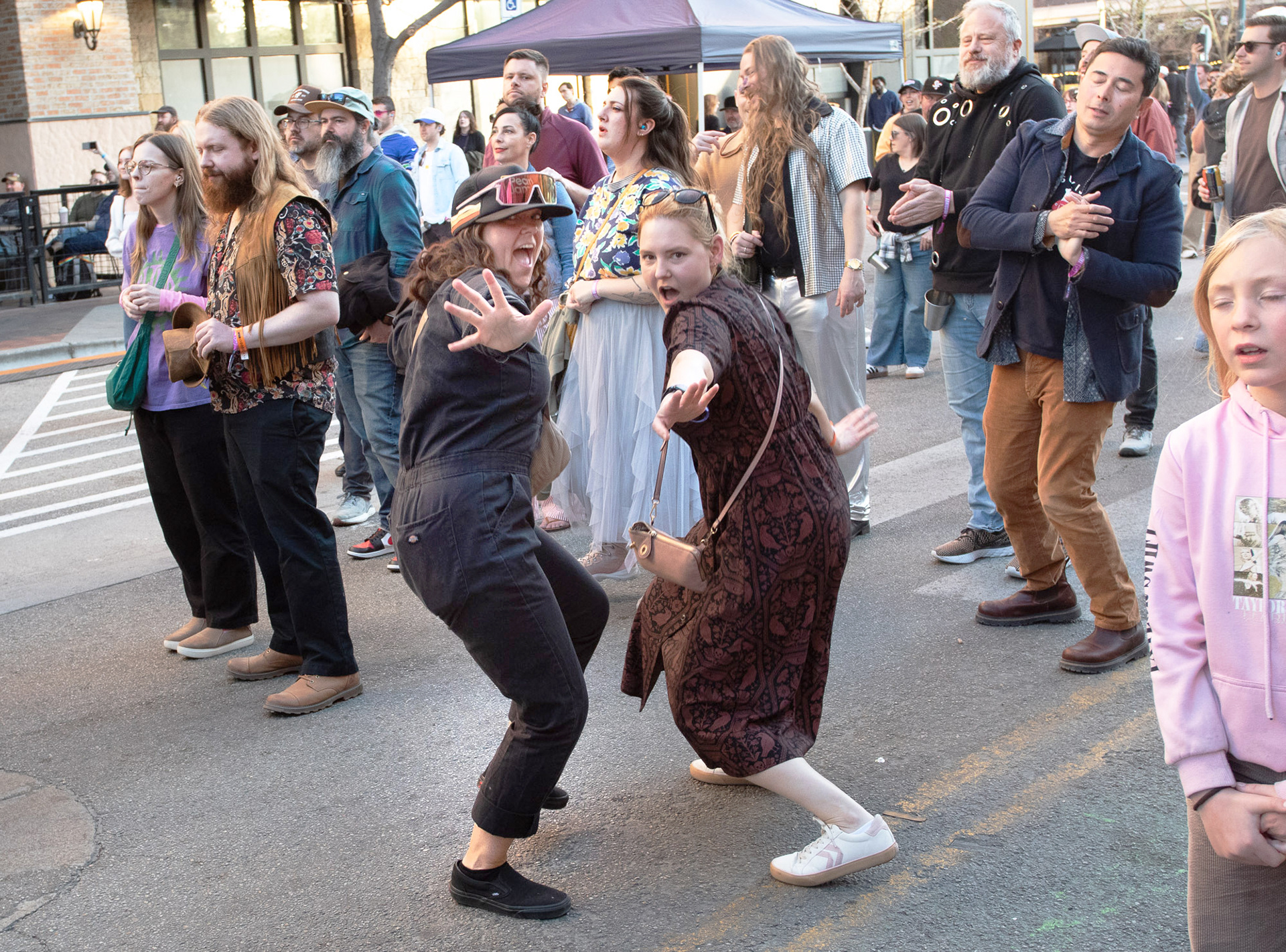 Dancing ladies enjoying Social Cinema music at the Cyclops
