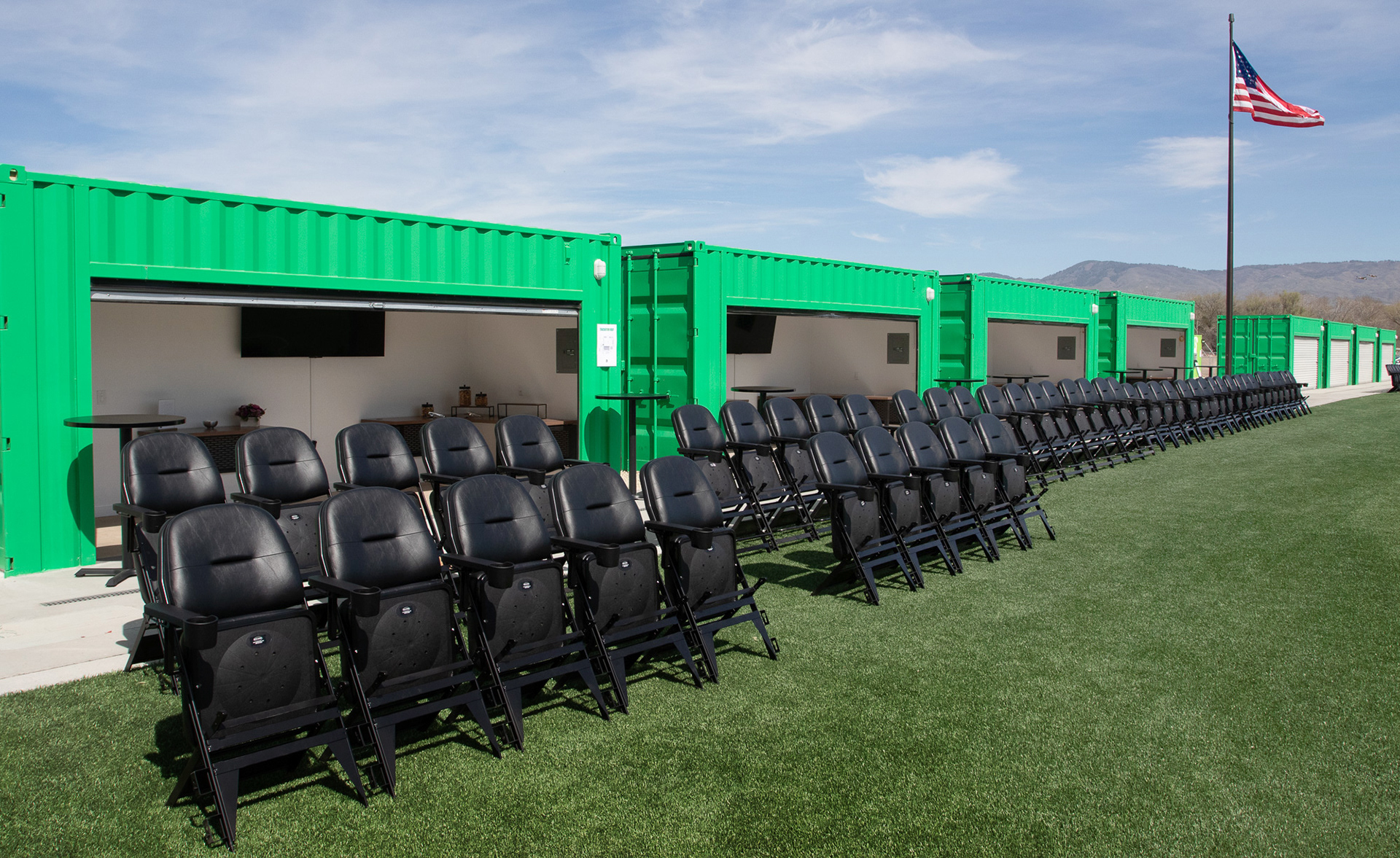 sideline seating on the pitch behind goal