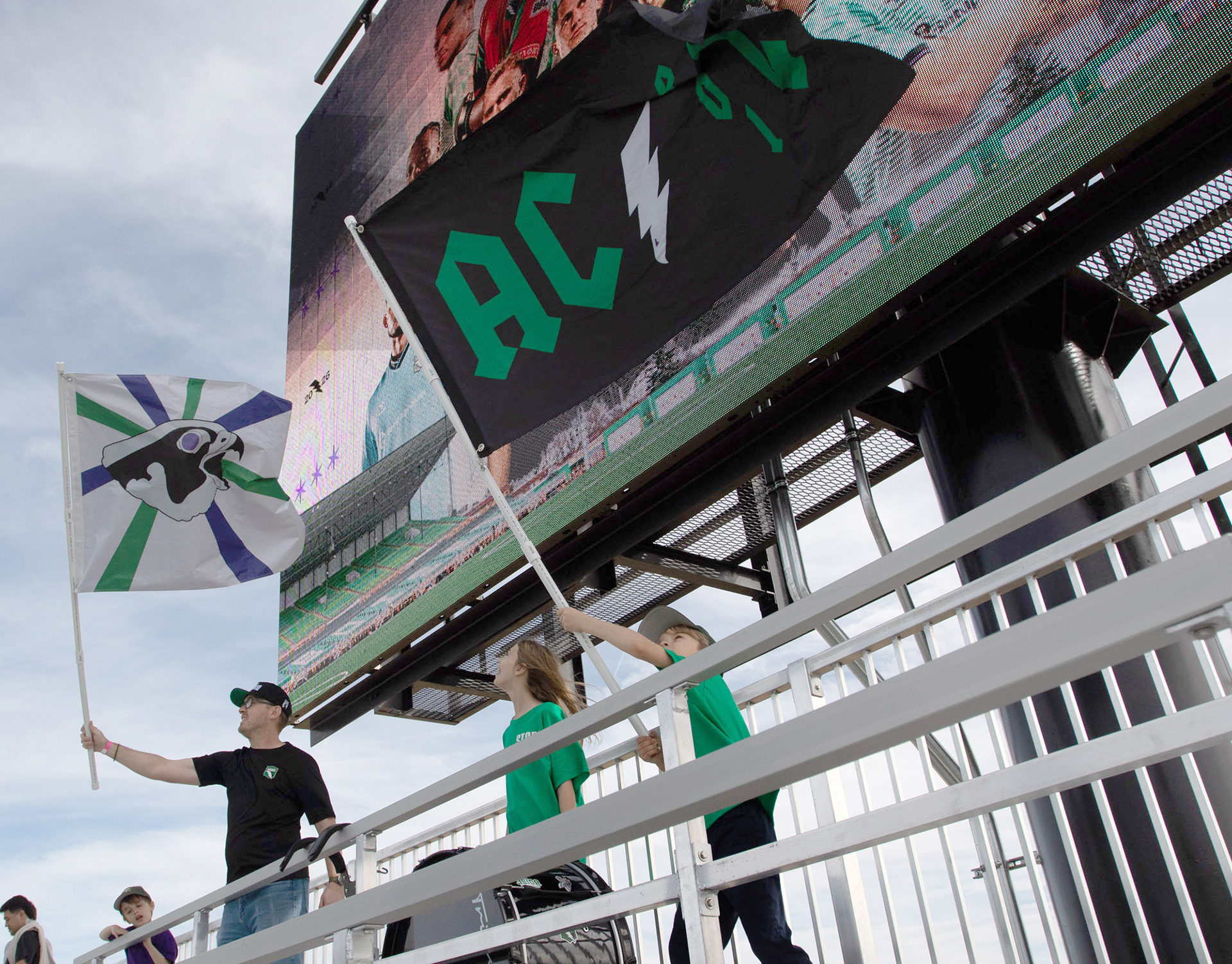 members of the River Guard waving flags