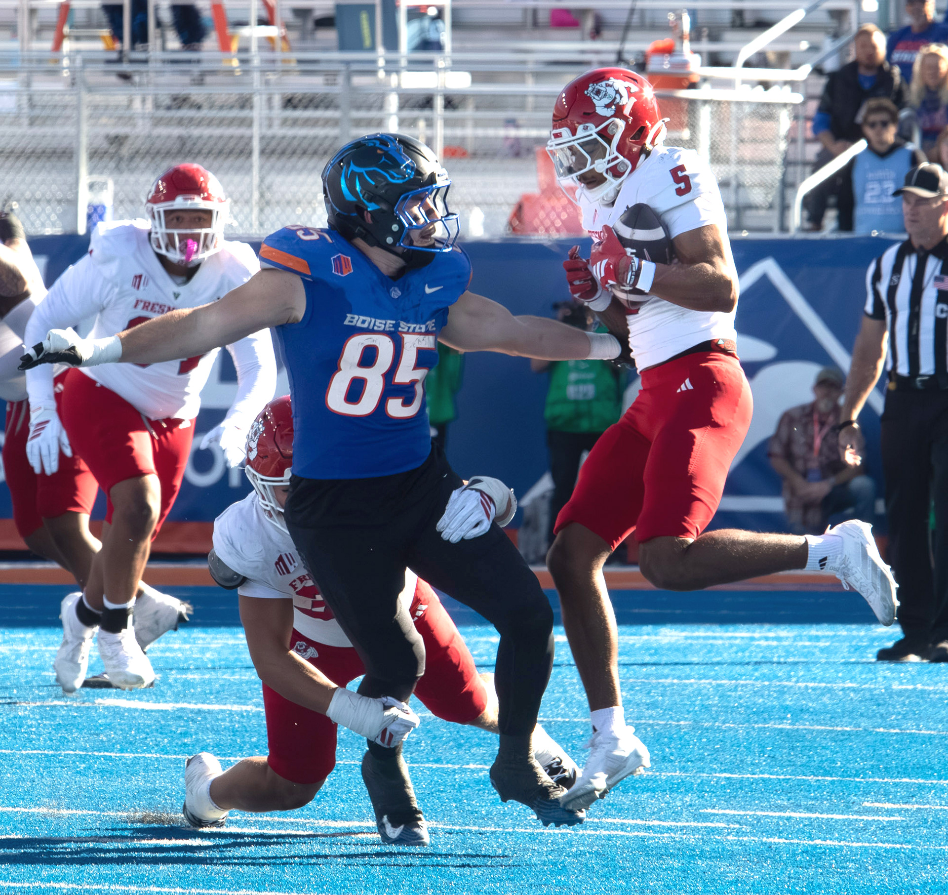 A pass intended for Boise State University's Matt Lauter is intercepted by Fresno State's Josiah Freeman during football game at  Albertsons Stadium Saturday, November 1, 2025