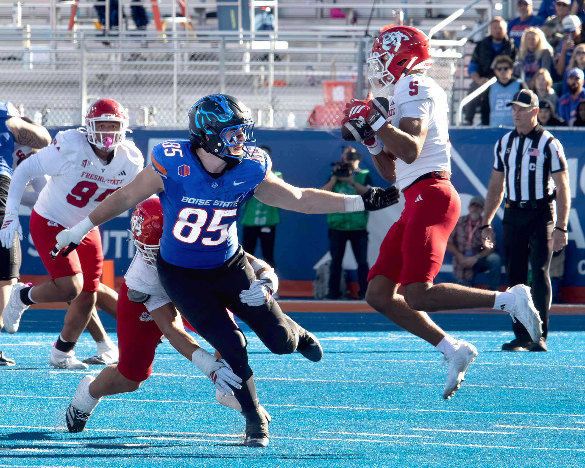 A pass intended for Boise State University's Matt Lauter is intercepted by Fresno State's Josiah Freeman during football game at  Albertsons Stadium Saturday, November 1, 2025