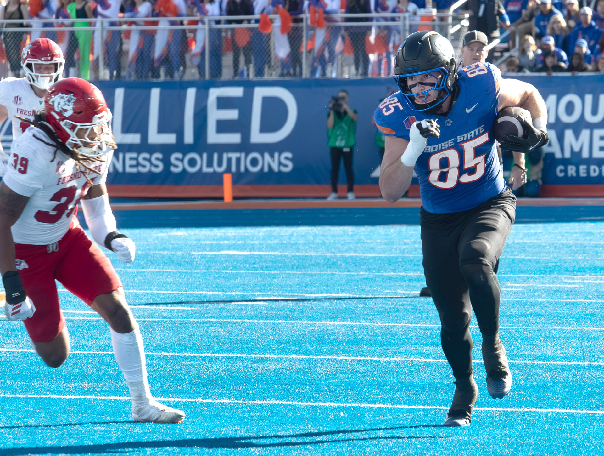 Dylan Riley, running back for Boise State University, hits the defensive Fresno State wall during football game at Albertsons Stadium Saturday, November 1, 2025