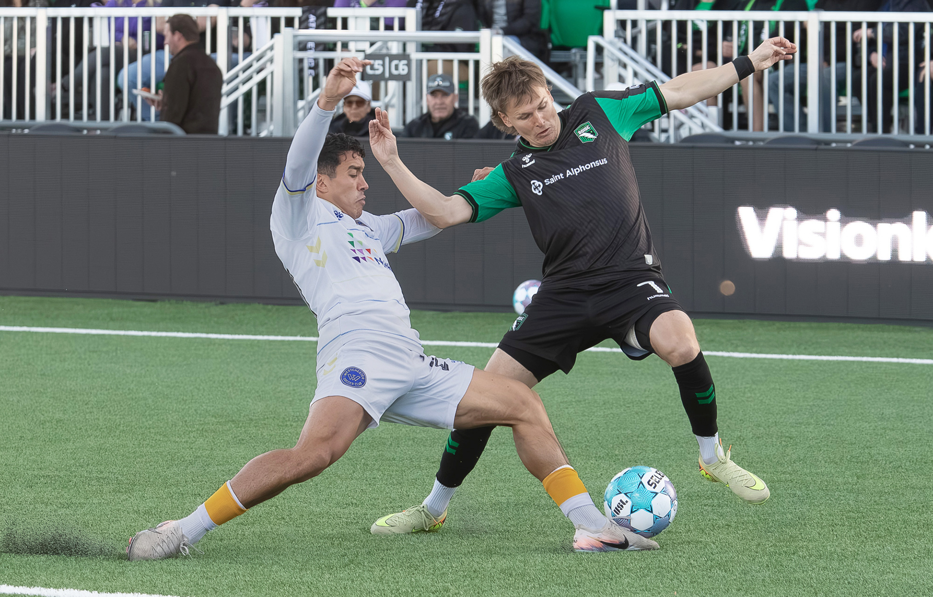 Blake Bodily (7) for Athletic Club Boise gets the ball past Jonathan Jimenez (27) for Westchester Soccer Club during soccer match at Les Bois Park on Saturday.