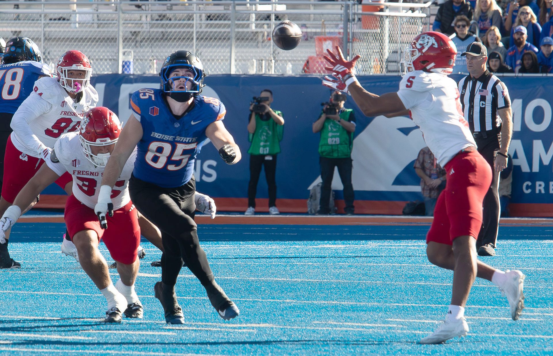 A pass intended for Boise State University's Matt Lauter is intercepted by Fresno State's Josiah Freeman during football game at  Albertsons Stadium Saturday, November 1, 2025