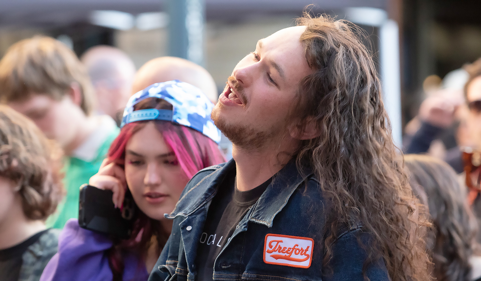 Social Cinema fan sings and dances to music at the Cyclops