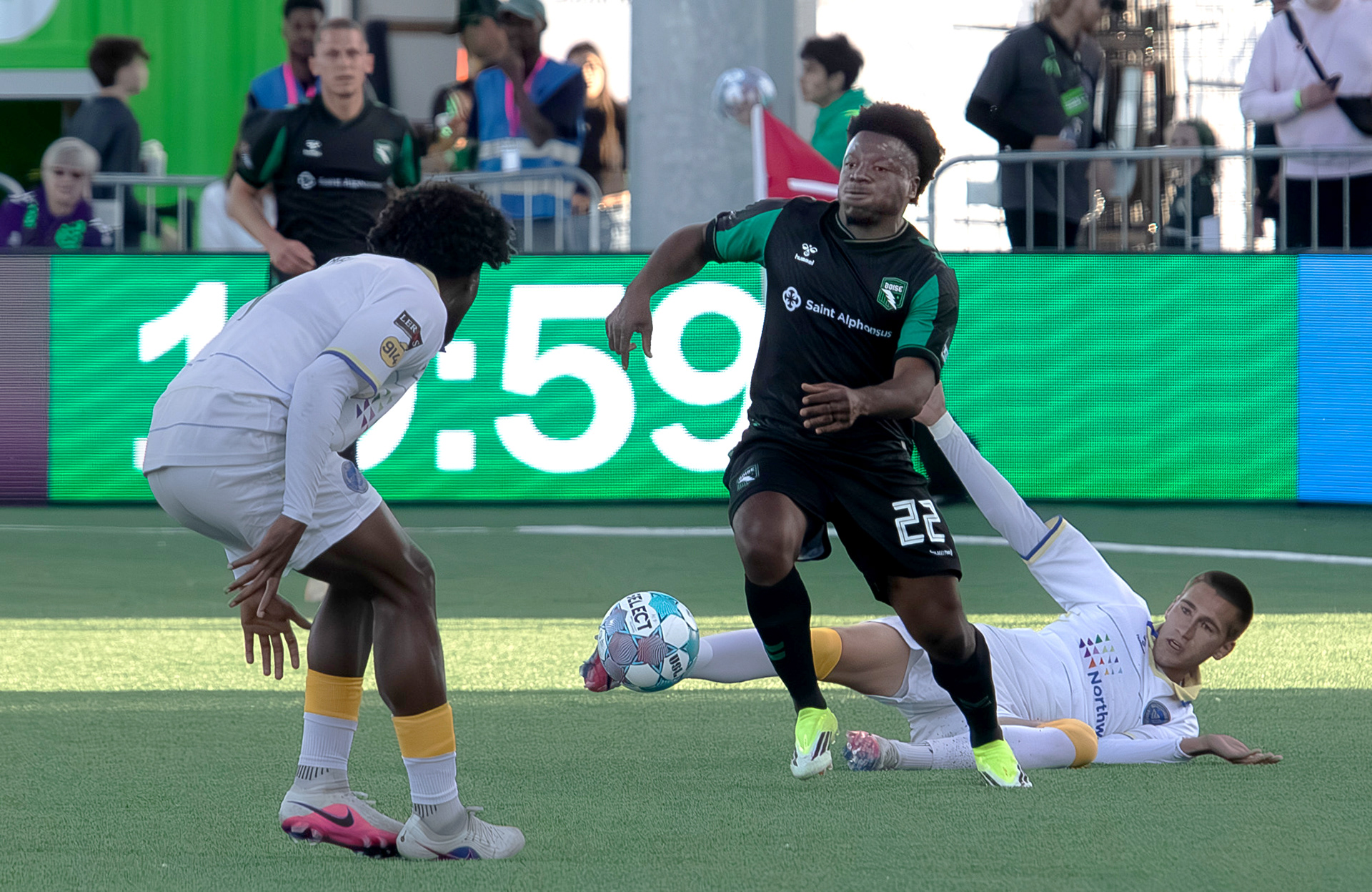 Thomas Amang for Athletic Club Boise (22) takes the ball away from Timofey Timchenko (5) of  Westchester Soccer Club during soccer match at Les Bois Park on Saturday, April 18, 2026.