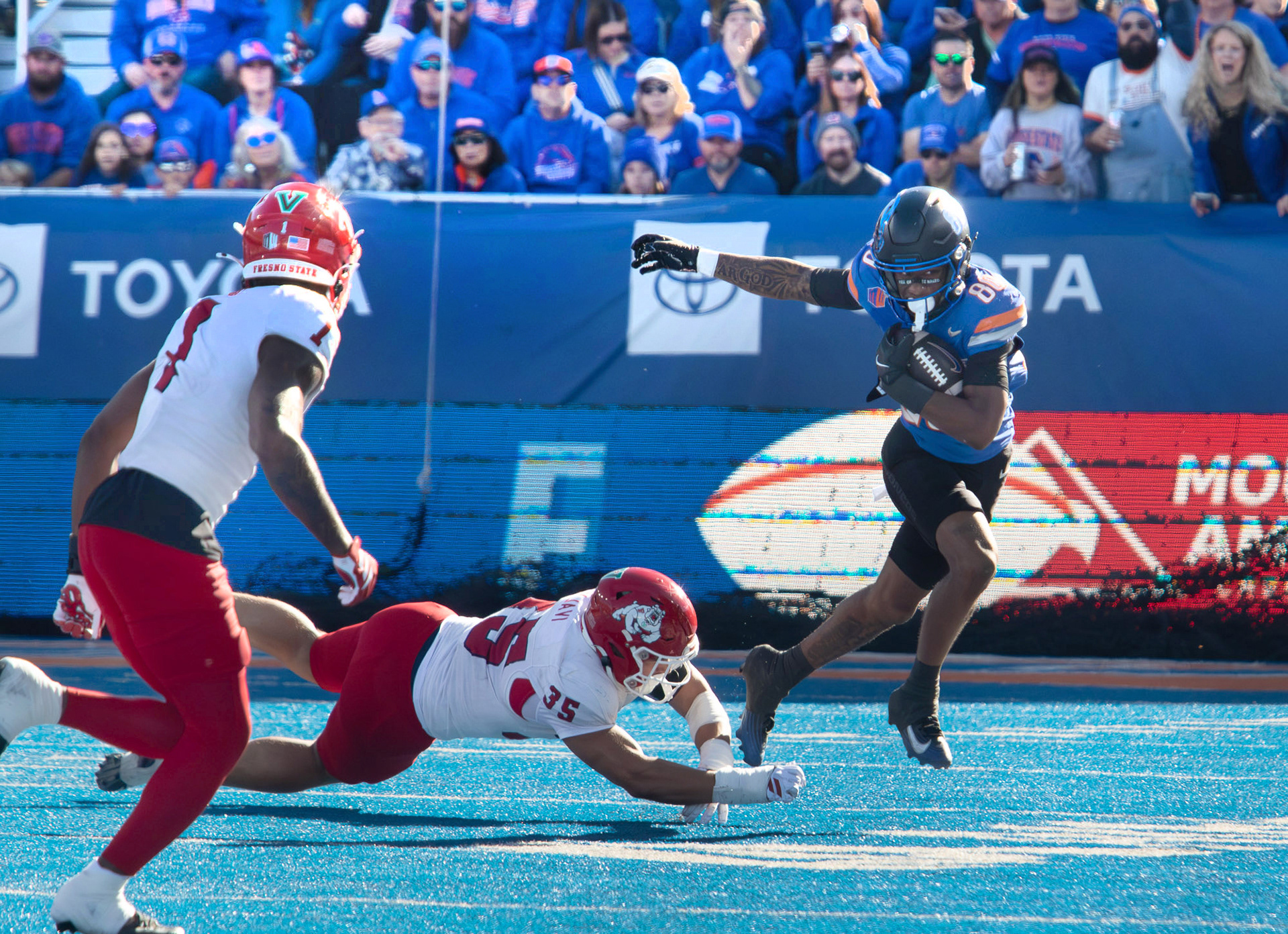 Cameron Bates, wide receiver for Boise State University escapes a tackle during football game against Fresno State  at Albertsons Stadium Saturday, November 1, 2025