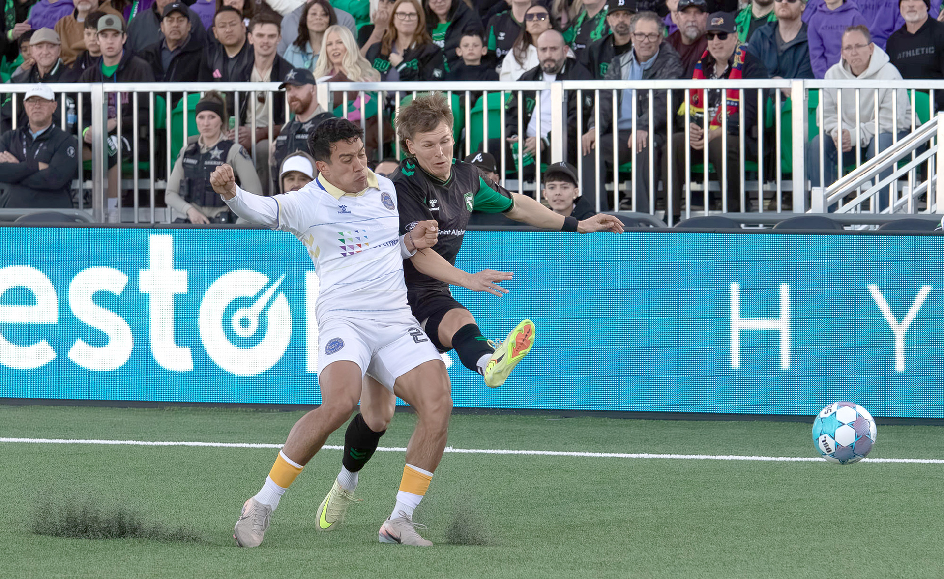 Athletic Club Boise's Blake Bodily (7) collides with Jonathan Jimenez (27) of Westchester Soccer Club during soccer match at Les Bois Park on Saturday, April 18, 2026