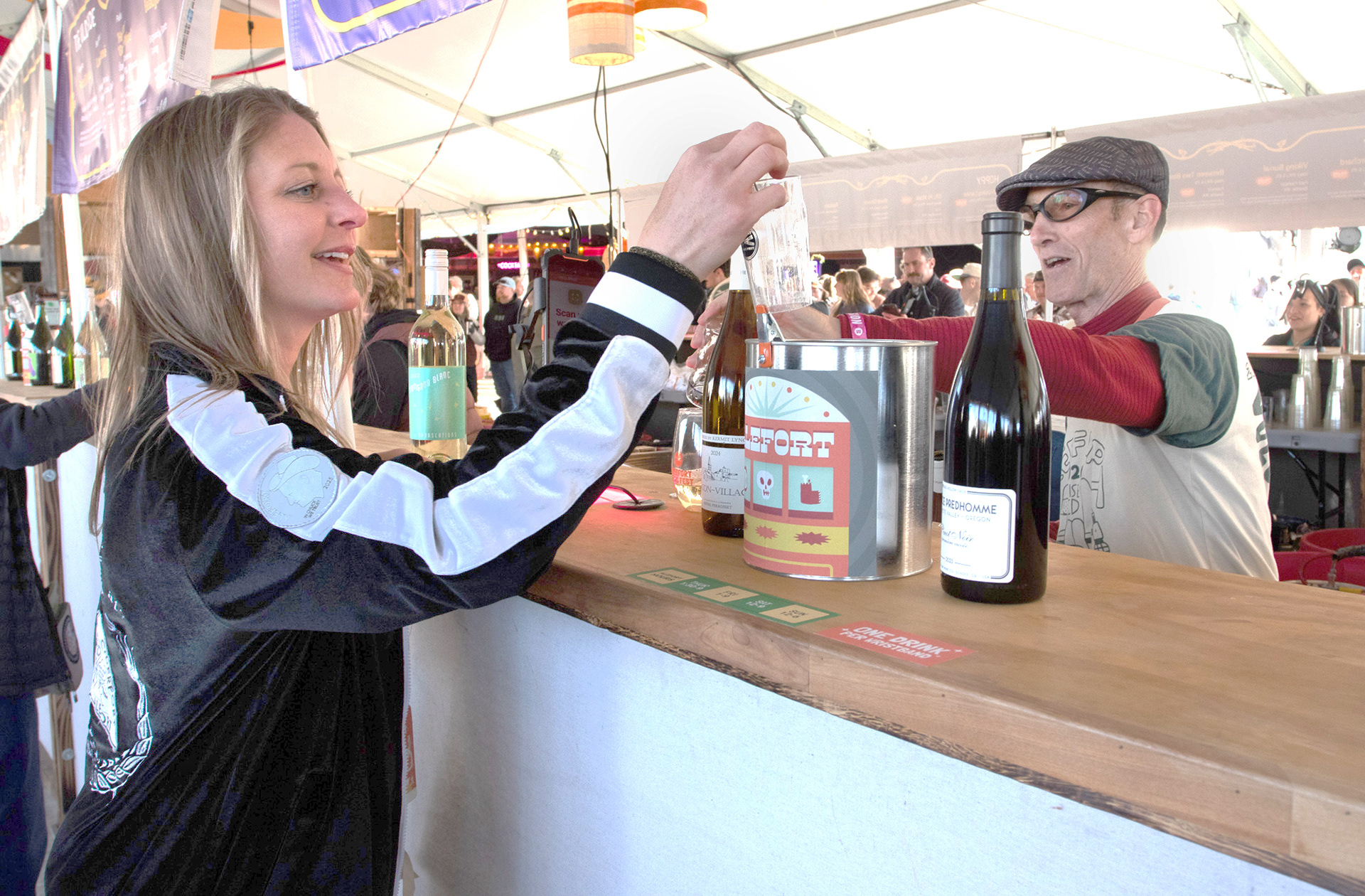 Jackie Elo, Wine Director at Alefort, gets a glass poured by Steven Holbrook
