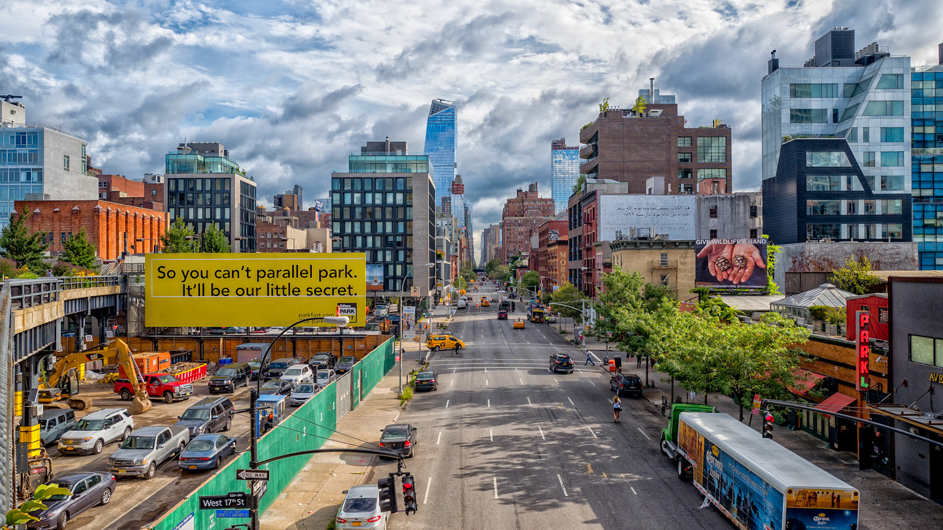NYC from above the streets on the High Line.  Incredible cloudy skys during this visit and popped during post editing process.