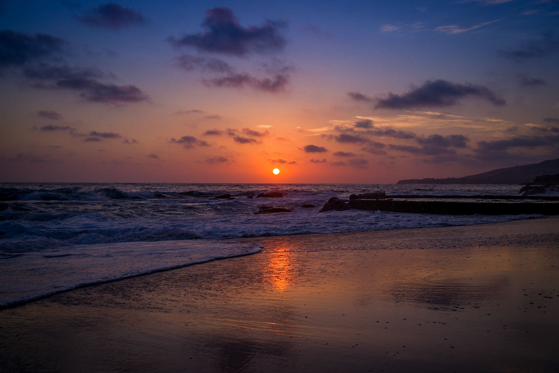The ever changing sky during sunsets can be so mesmerizing.  This photograph was captured on the same day as my “A Splash of Sunset” picture at Victoria Beach in Laguna Beach, California.   Same location and moments last, but the colors are extremely different.  Photography is about being patient and waiting for the unique moments in time.