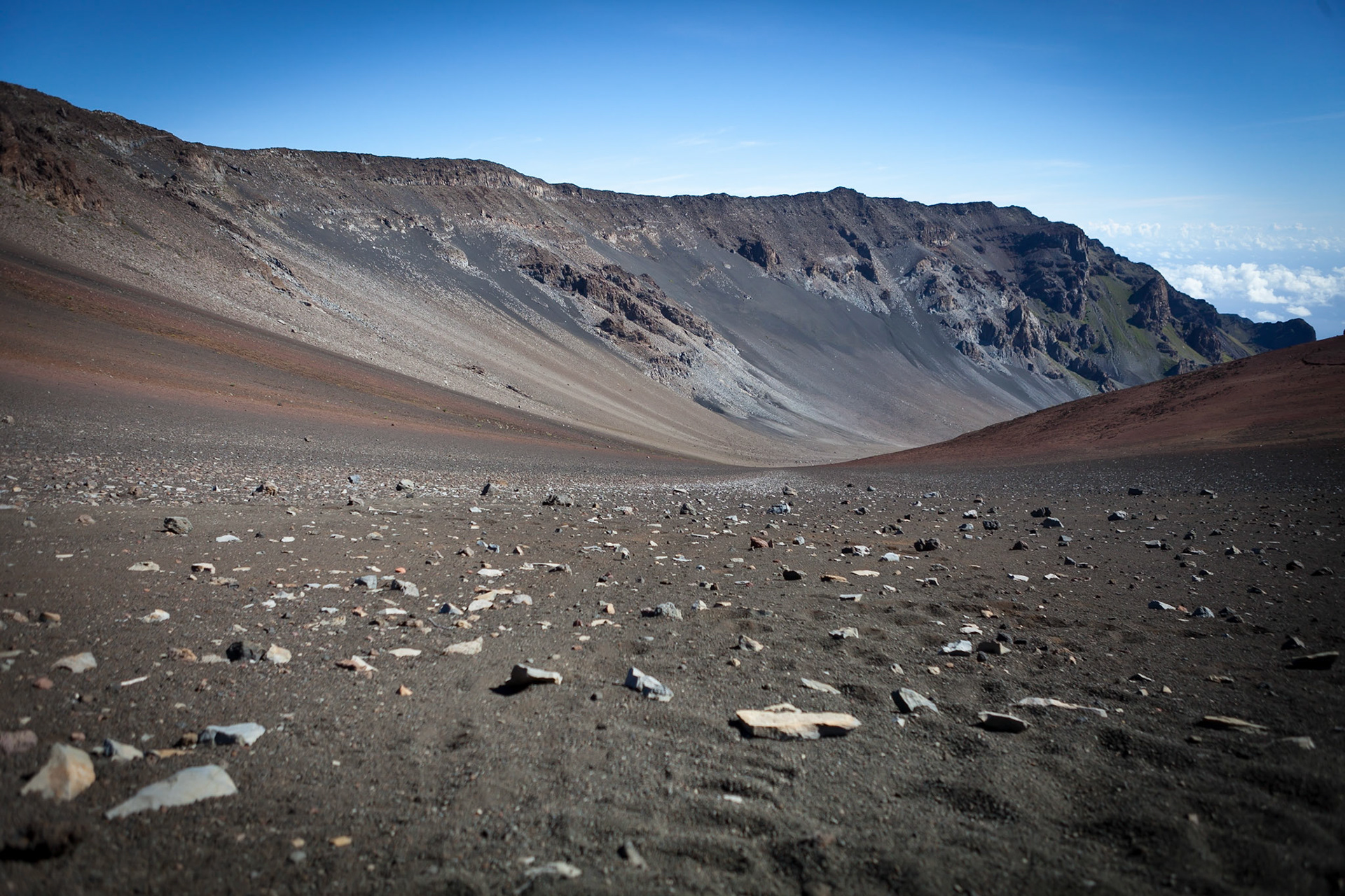 The terrain at the top of Haleakala Crater looms 10,023 feet above the Pacific Ocean, taking up three-quarters of Maui’s 727 square miles. Its ascent takes trekkers through 6 of the world’s 14 climate zones.  The entirety of the park, which comprises 33,265 acres, holds more endangered species than any other U.S. National Park.