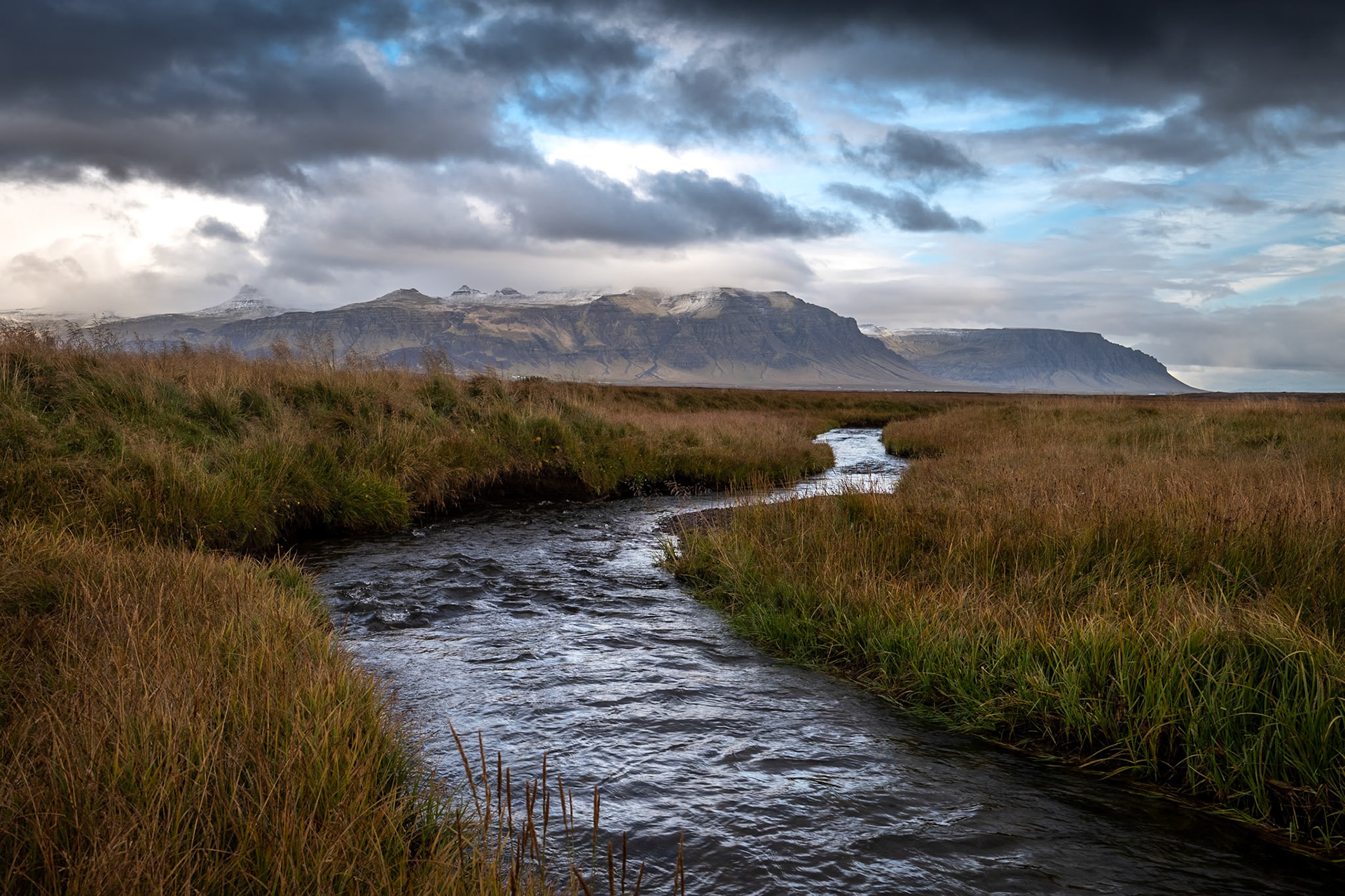 Iceland is full of rivers, streams and waterfalls.  Everywhere you look  your eyes will follow the water into beautiful landscapes.  This picture was taken alongside the primary highway that circles the island.