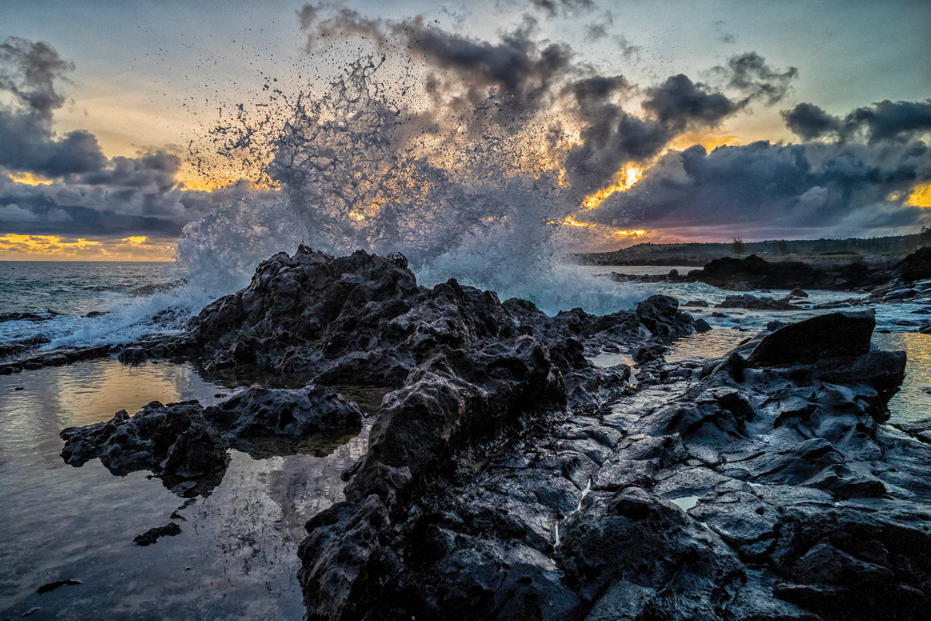 Another sunrise photograph literally frozen in time.  The sunrise alone is inspiring, but the frozen splash from the incoming tide adds to the idea of capturing a moment in time that will never repeat again.