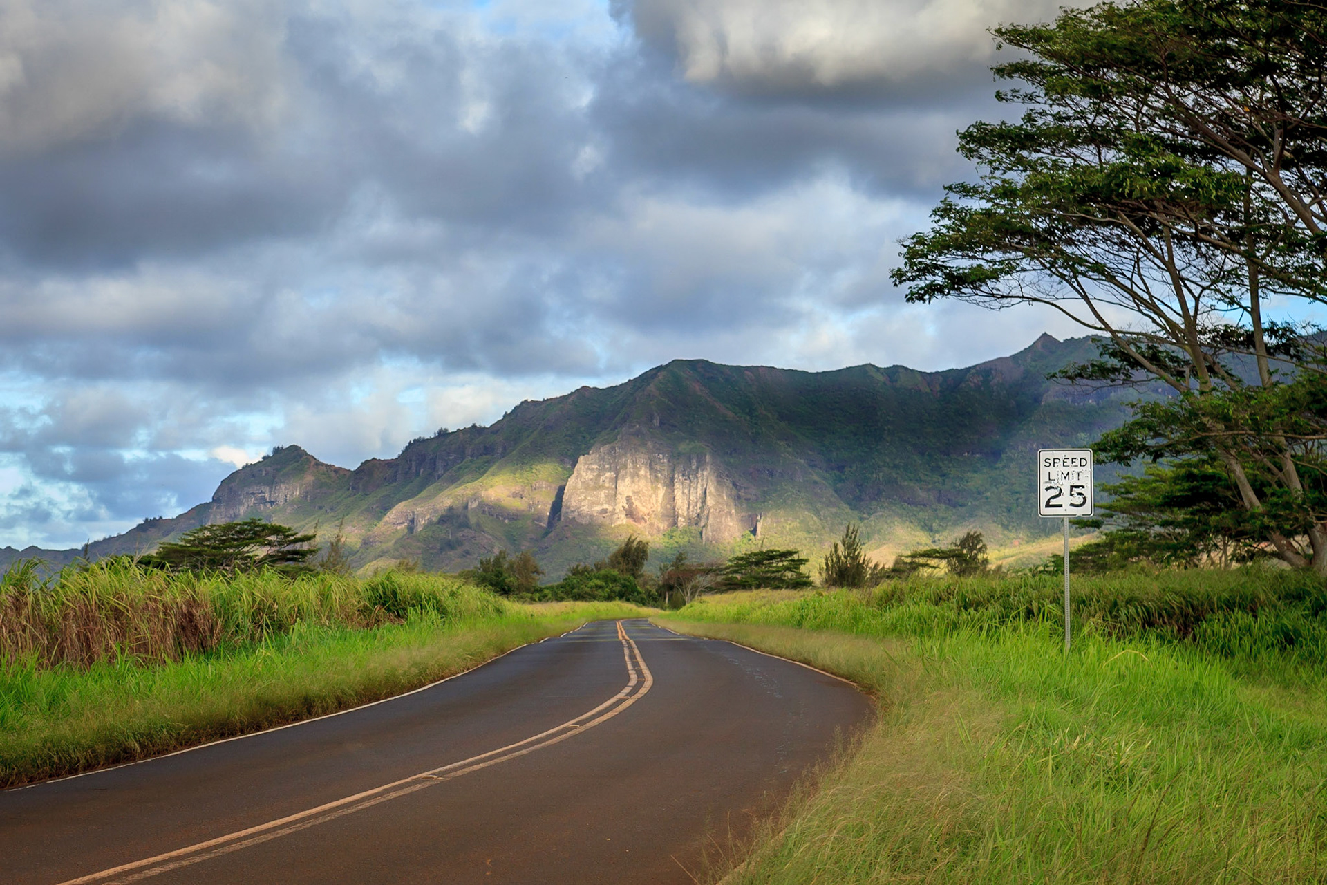 The island of Kauai in Hawaii has a way of slowing down life and this twisting road with its 25 MPH Speed Limit is a greater reminder to slow down and enjoy life.