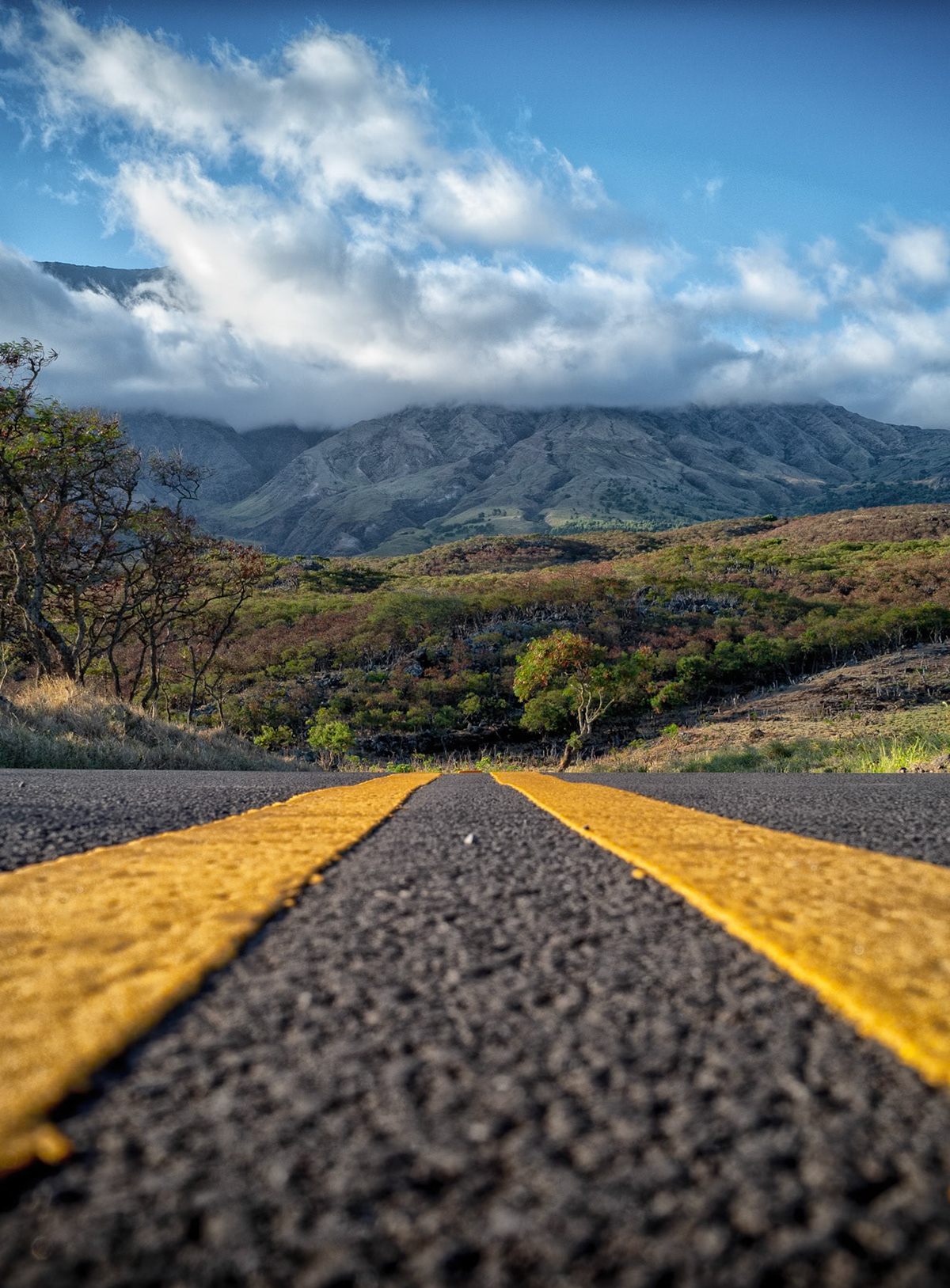 The Road to Hana in Maui, Hawaii provides for some inspiring scenery, but this photograph is not from the main section of the popular drive.  The main portion of the Road to Hana in and of itself is a long drive, but if you make the decision to keep going it is REALLY long.  Thirteen hours after leaving our Condo in Kapalua Bay, we made it back.  The reward is a road less traveled that provides a very different landscape with a lot less people.