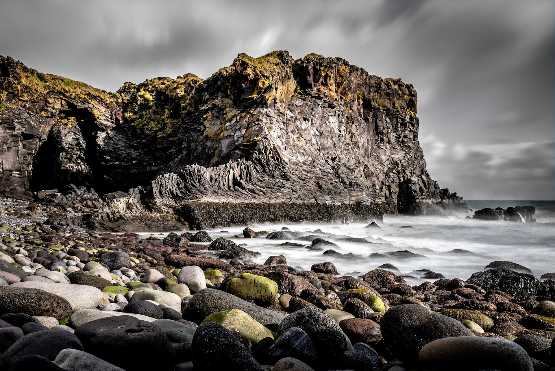While traveling in Iceland our cottage in Arnarstapi had this very cool tightly cropped picture of some coastal rock formations.  The next day after about a 10 minute drive we ventured down to the coast and found this amazing location.  The picture from the cottage was a close up of this exact spot.  I like the long-exposure wider angle rendition, but the motivation was that cottage picture.