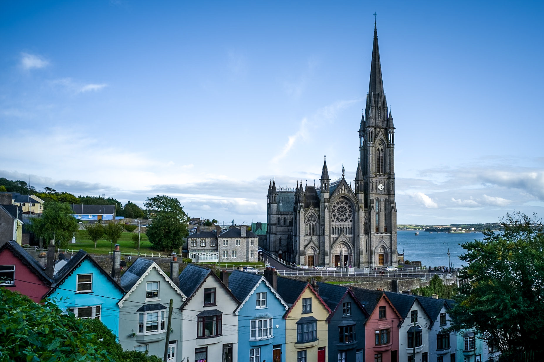 St. Colman's Cathederal in Cohb, Ireland took 47 years to complete this monolithic Catholic place of worship.  It took over 1 hour trying to find this great vantage point featuring the colorful "deck of cards" houses.