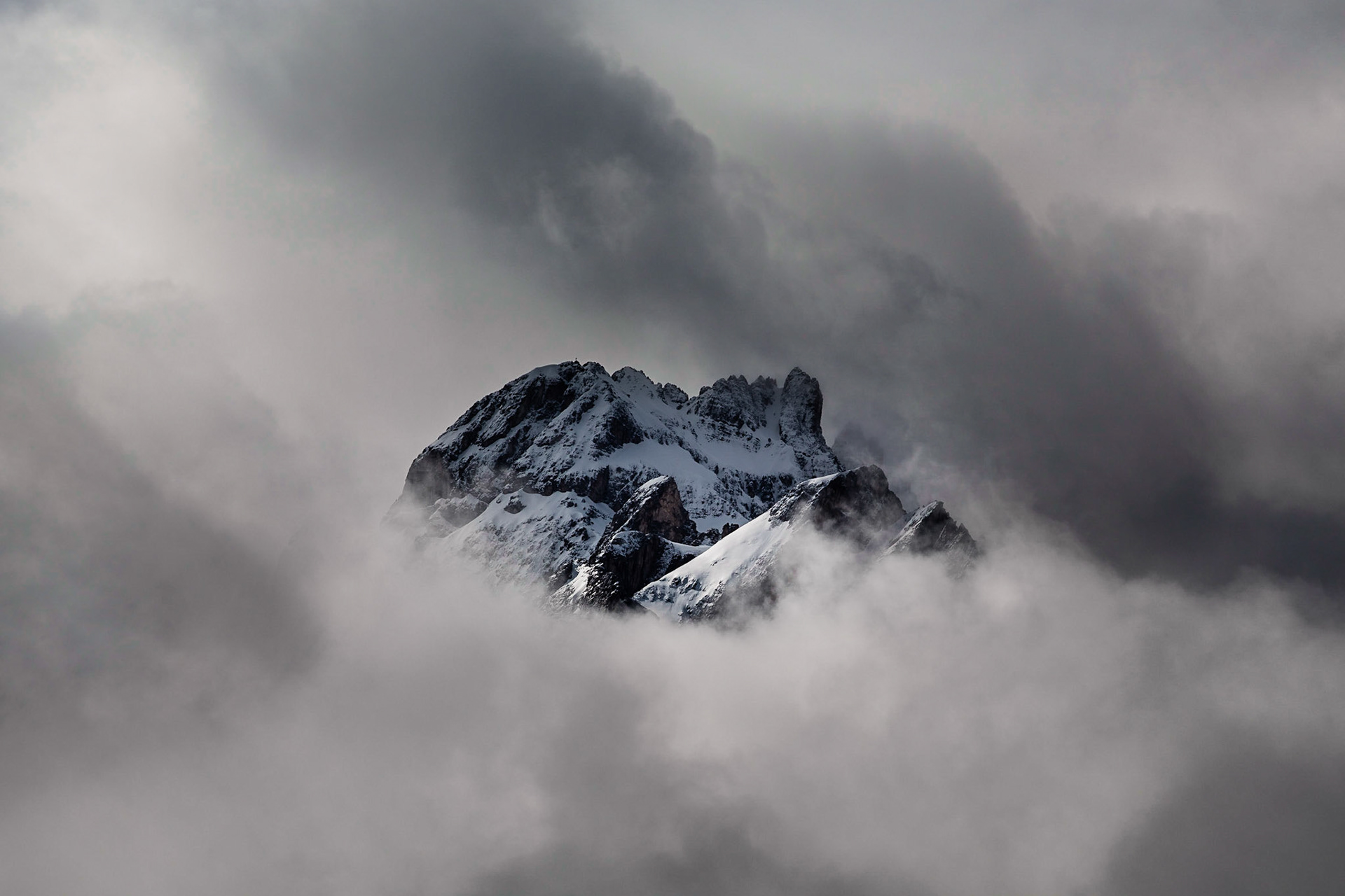 Mountain Top In Clouds