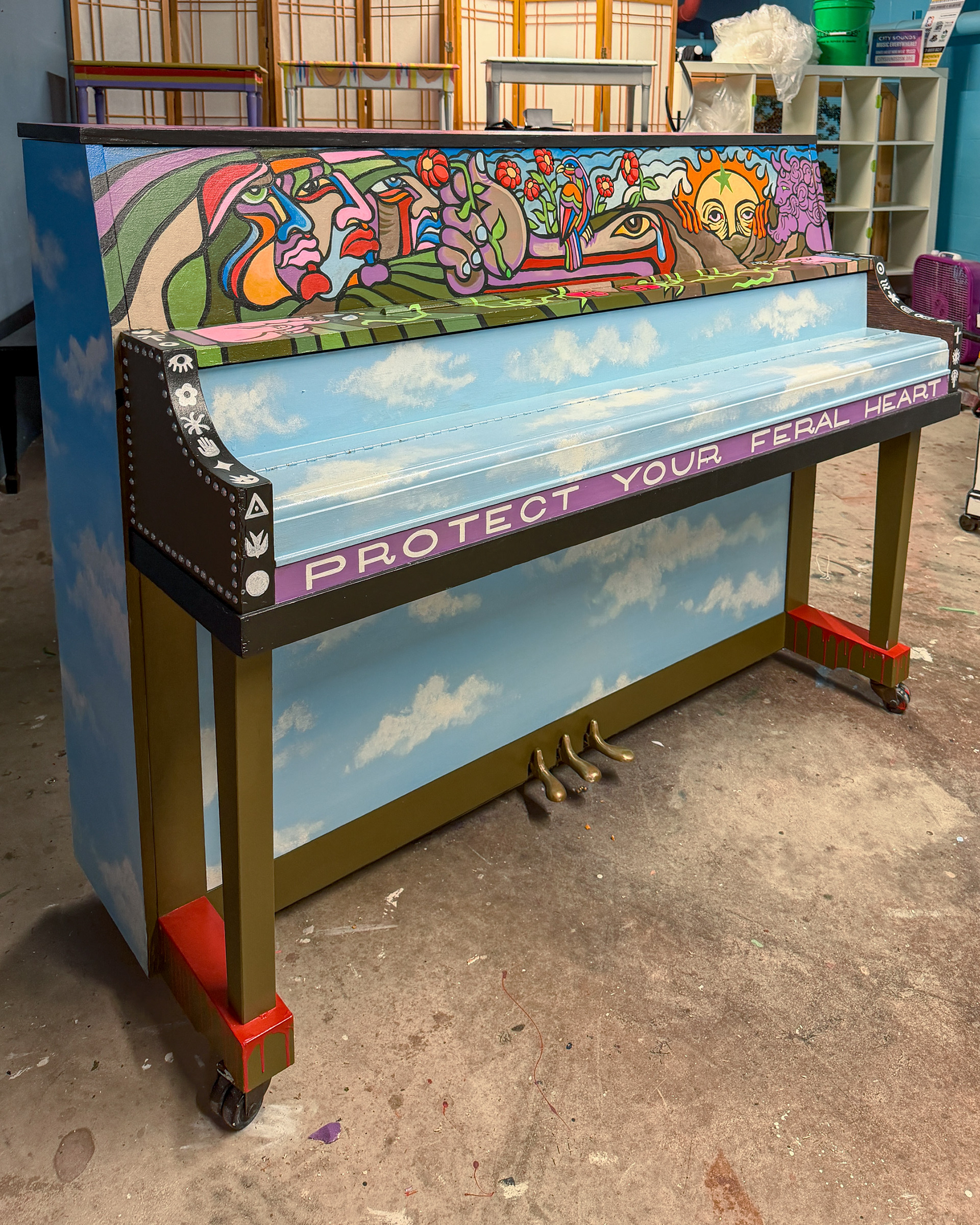 PROTECT YOUR FERAL HEART Latex & acrylic on piano. © 2026 for City Sounds Des Moines